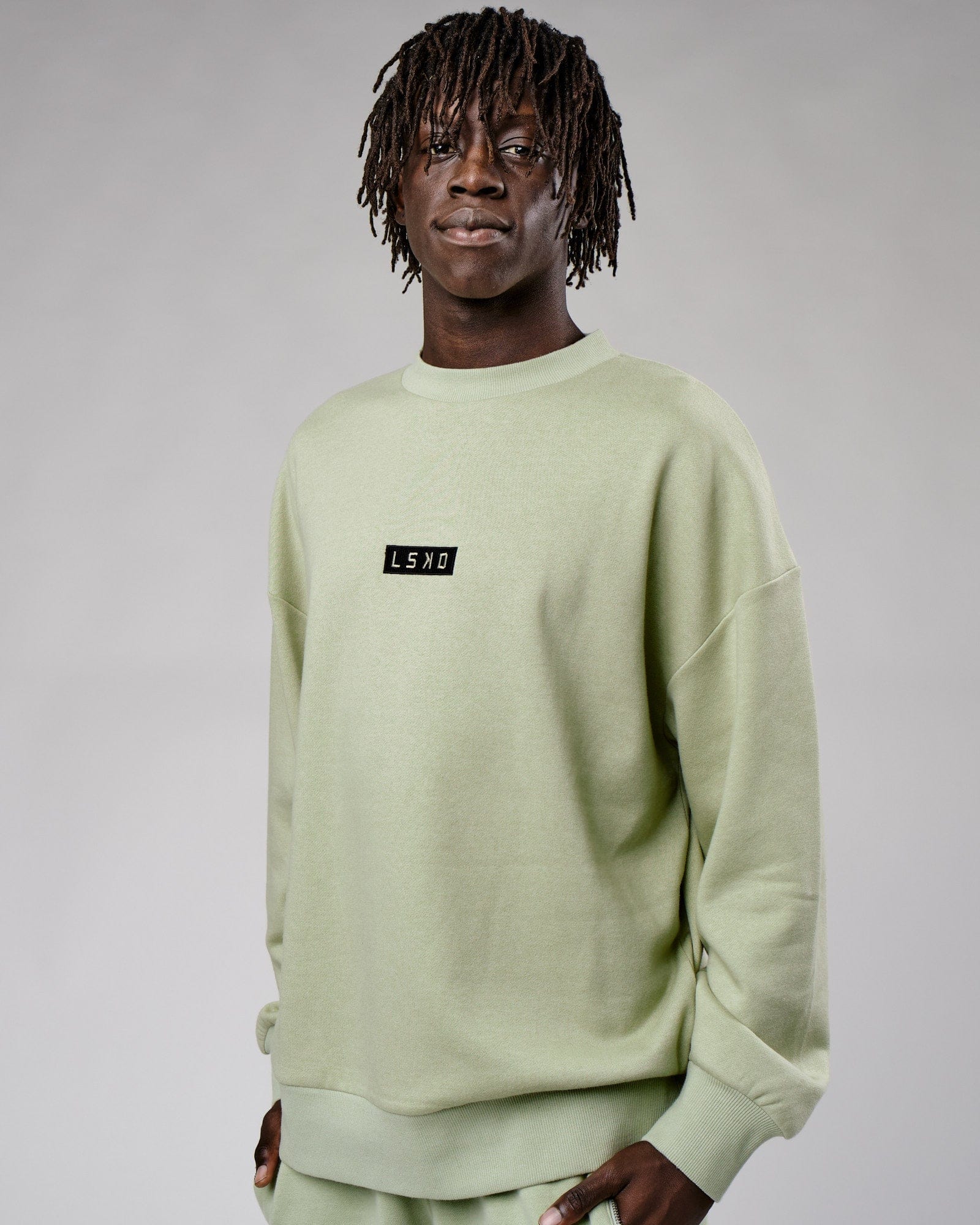 Model wearing Cornerstone Sweater Oversize - Desert Sage