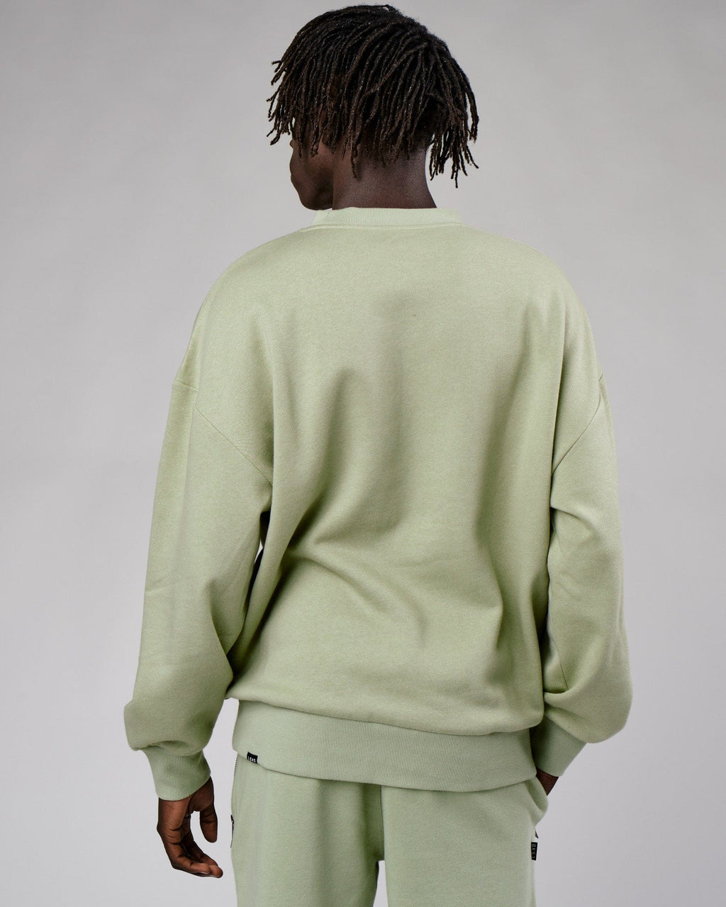 Model wearing Cornerstone Sweater Oversize - Desert Sage