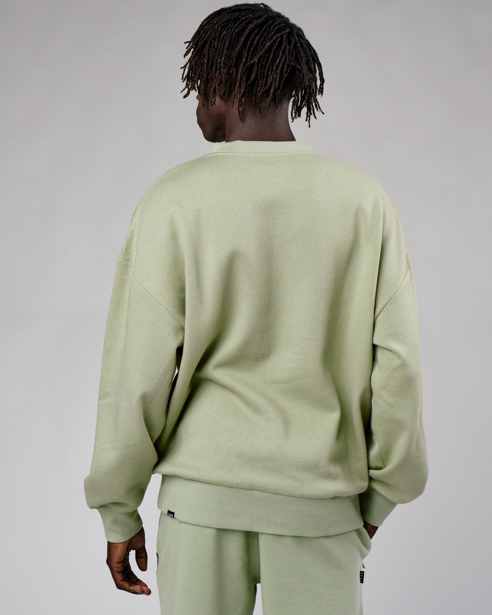 Model wearing Cornerstone Sweater Oversize - Desert Sage