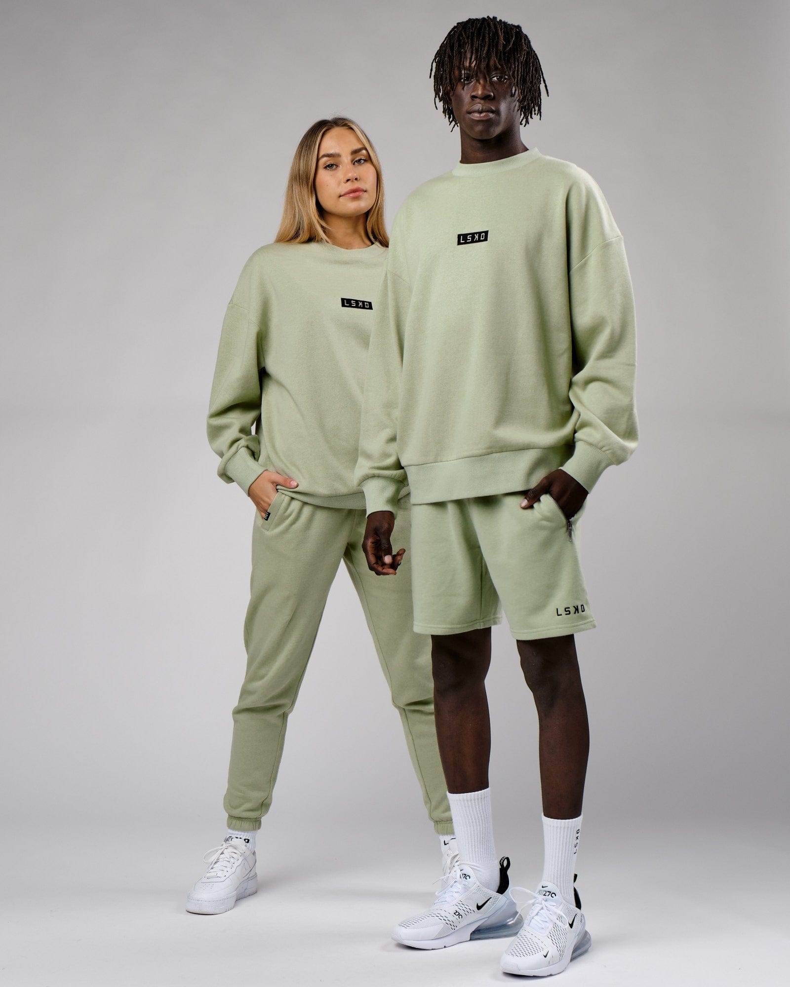 Model wearing Unisex Cornerstone Sweater Oversize - Desert Sage