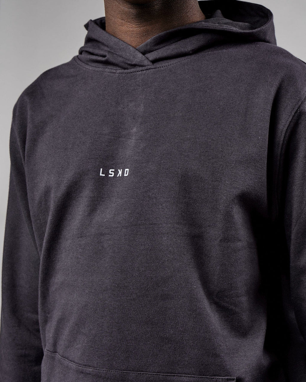 Model wearing Base Hoodie - Phantom