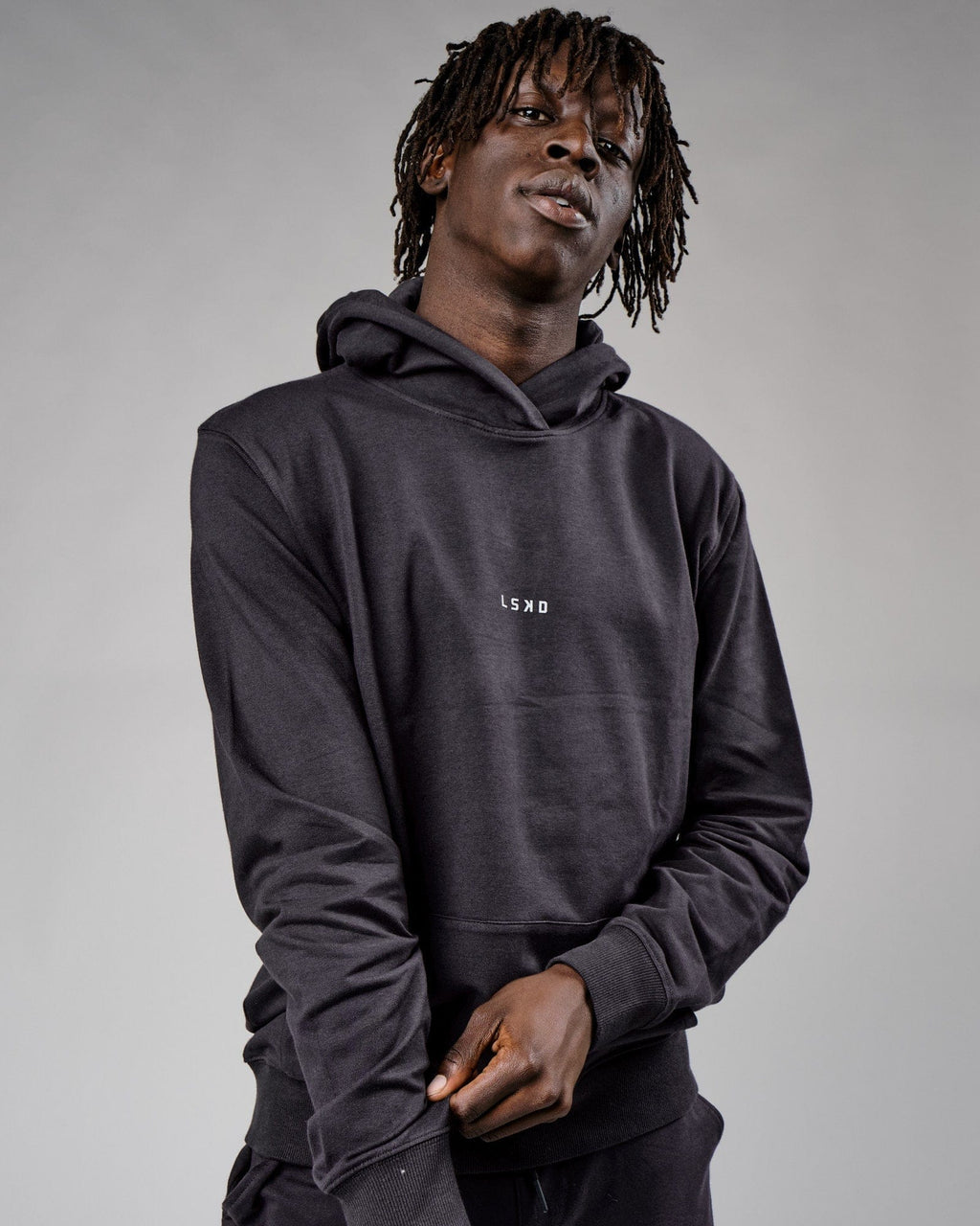 Model wearing Base Hoodie - Phantom