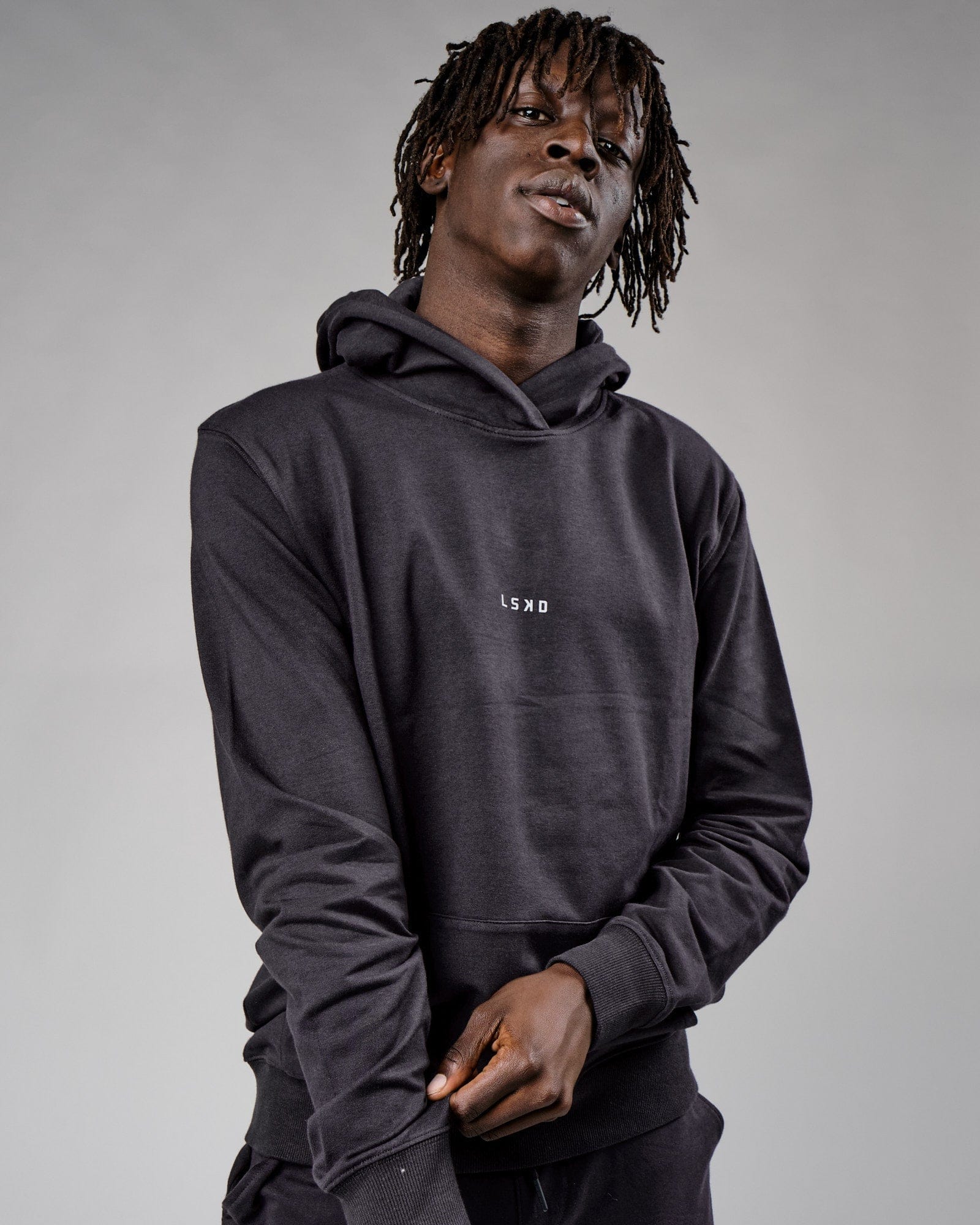 Model wearing Base Hoodie - Phantom