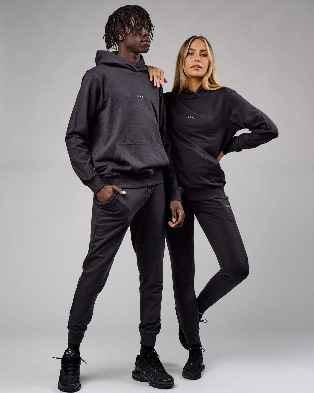 Model wearing Unisex Base Track Pant - Phantom