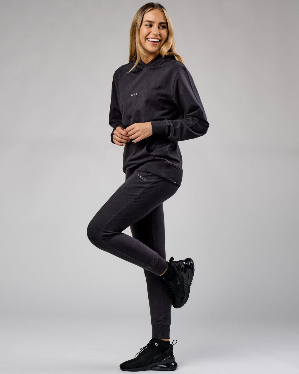 Model wearing Unisex Base Track Pant - Phantom