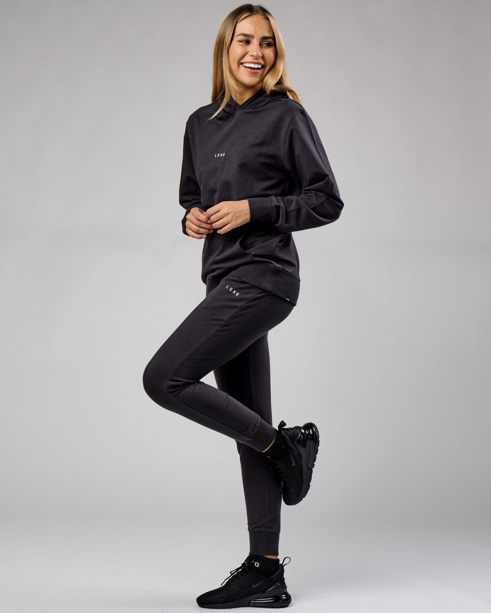 Model wearing Unisex Base Track Pant - Phantom