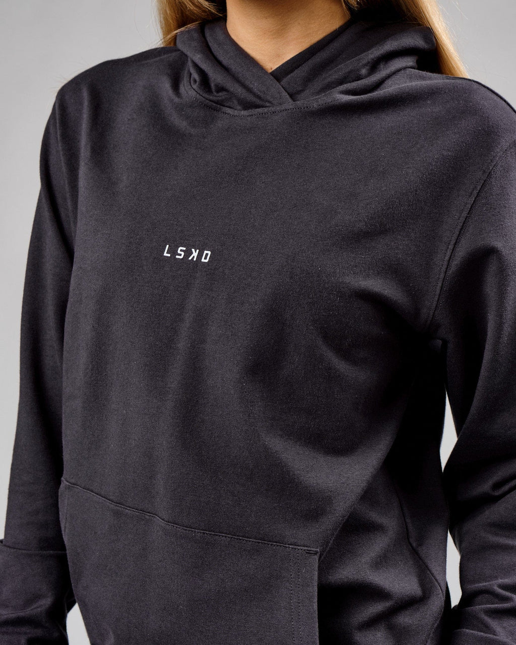 Model wearing Unisex Base Hoodie - Phantom