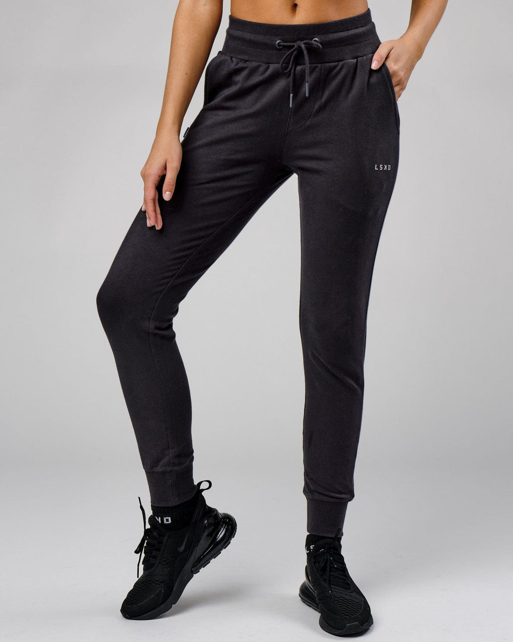 Model wearing Unisex Base Track Pant - Phantom