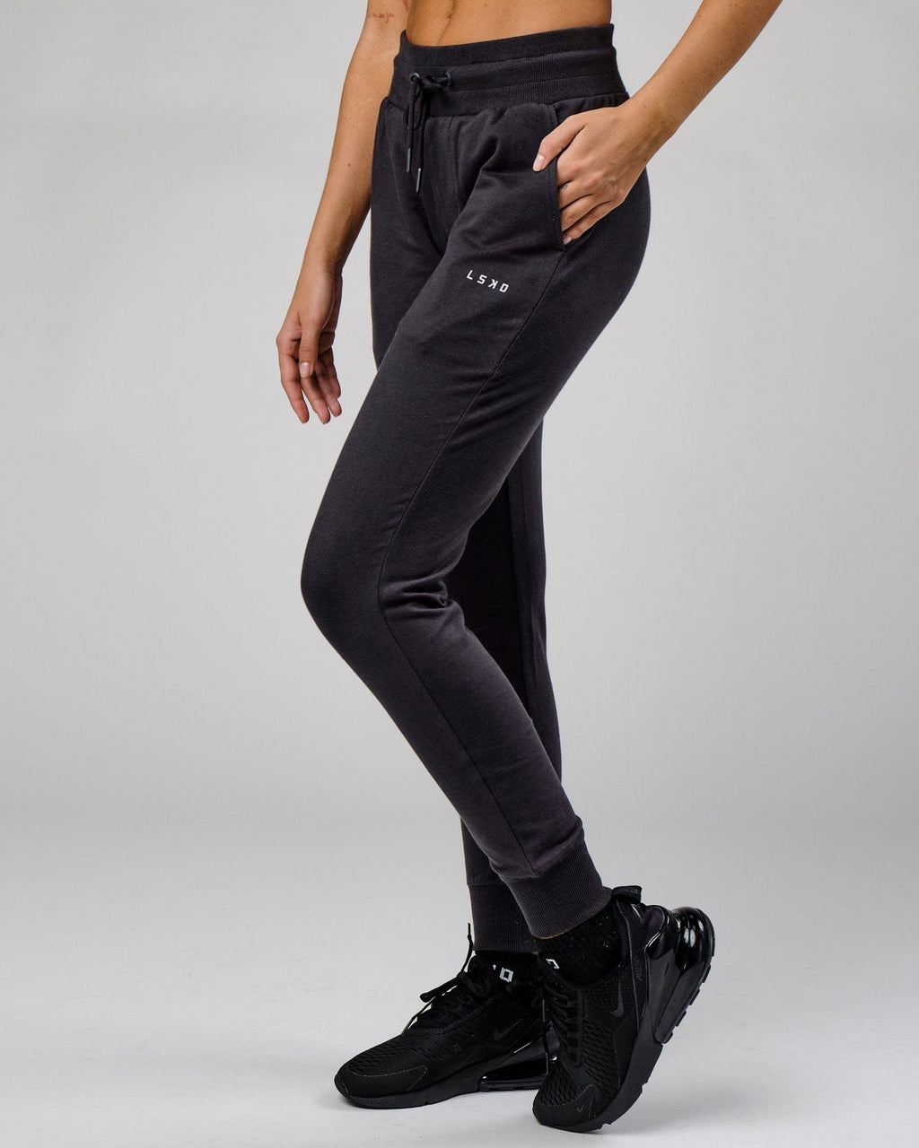 Model wearing Unisex Base Track Pant - Phantom