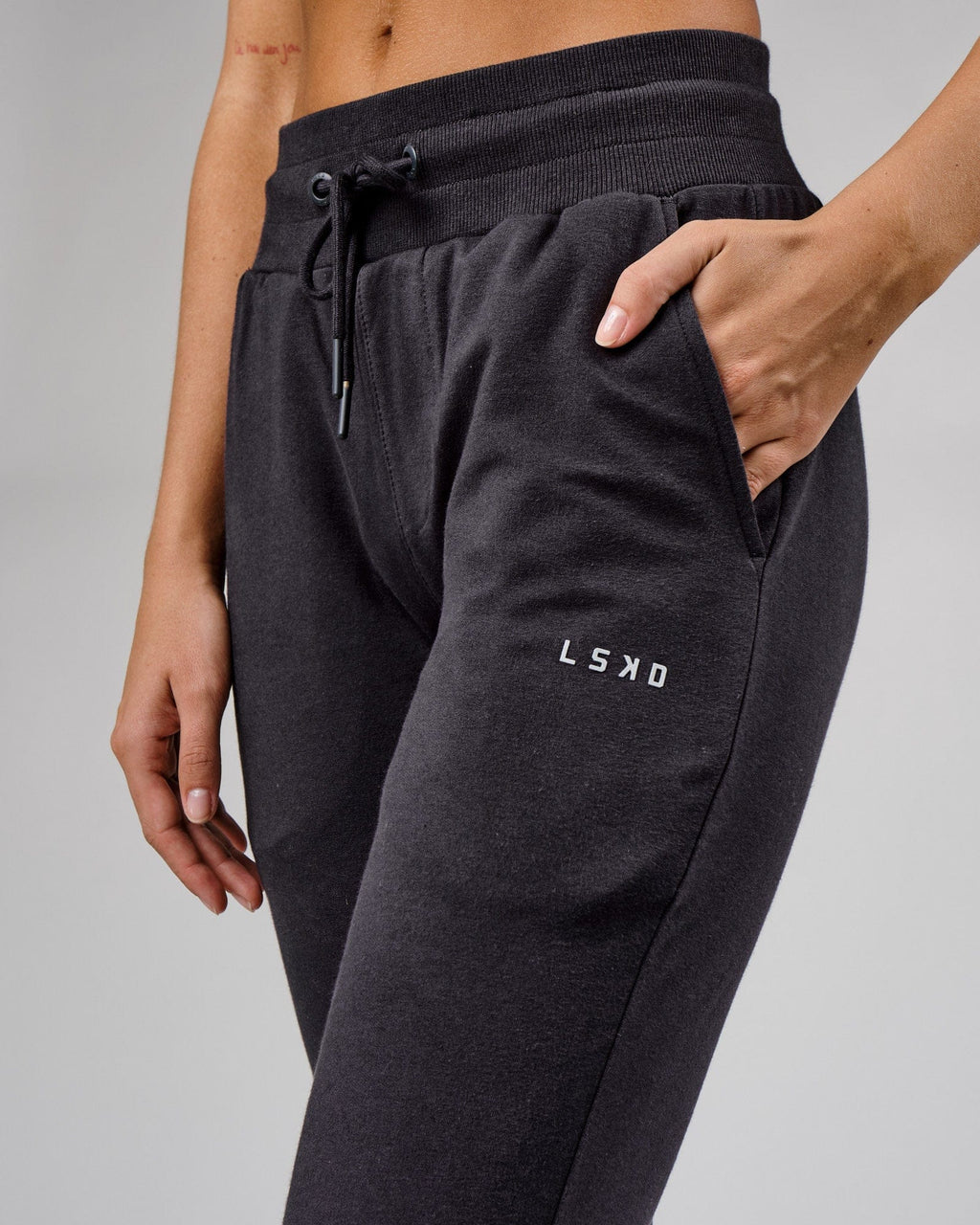 Model wearing Unisex Base Track Pant - Phantom