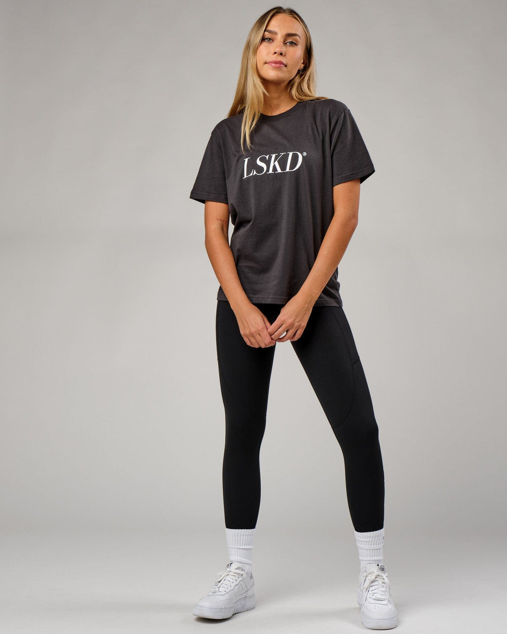 Model wearing IT Tee - Phantom