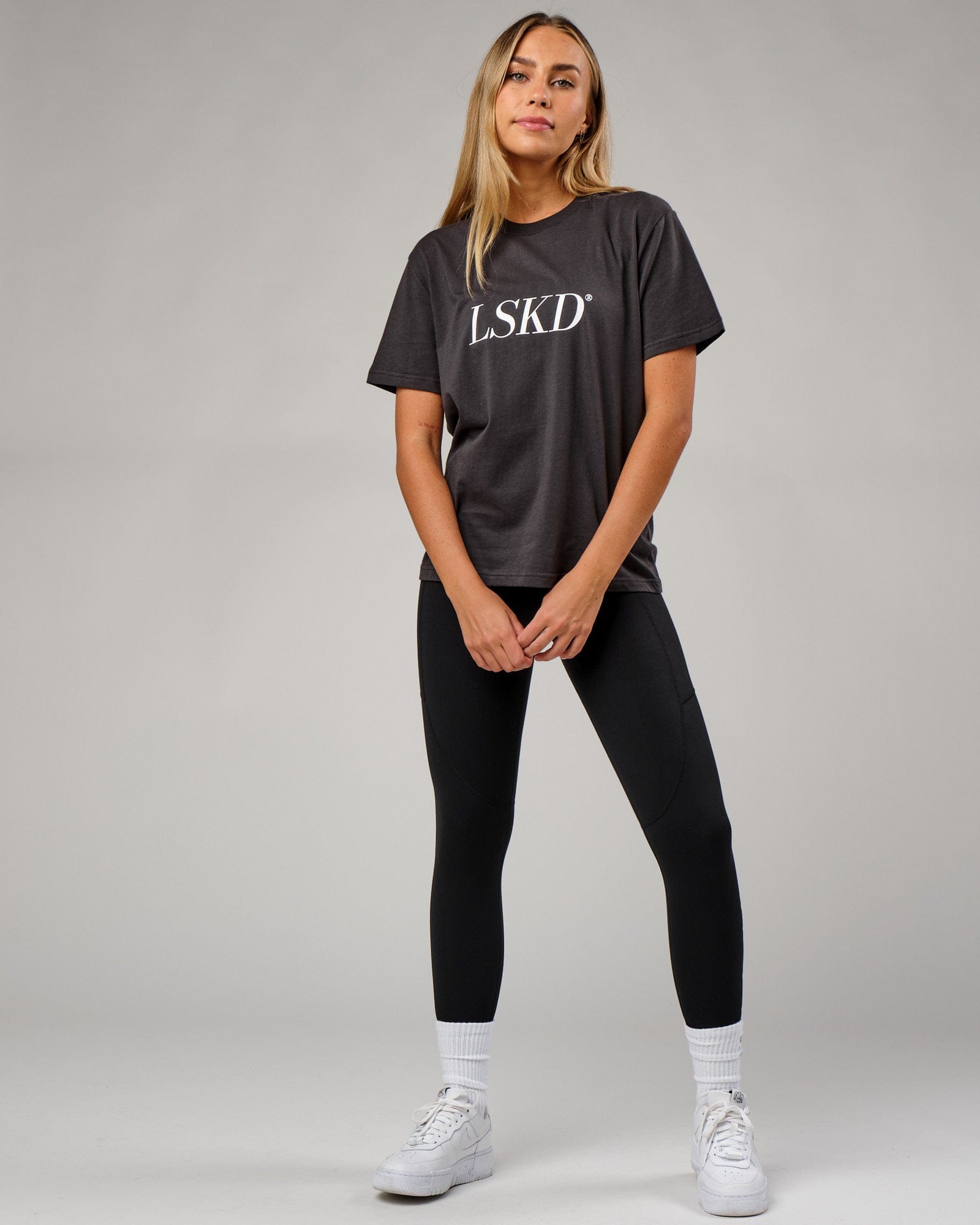 Model wearing IT Tee - Phantom