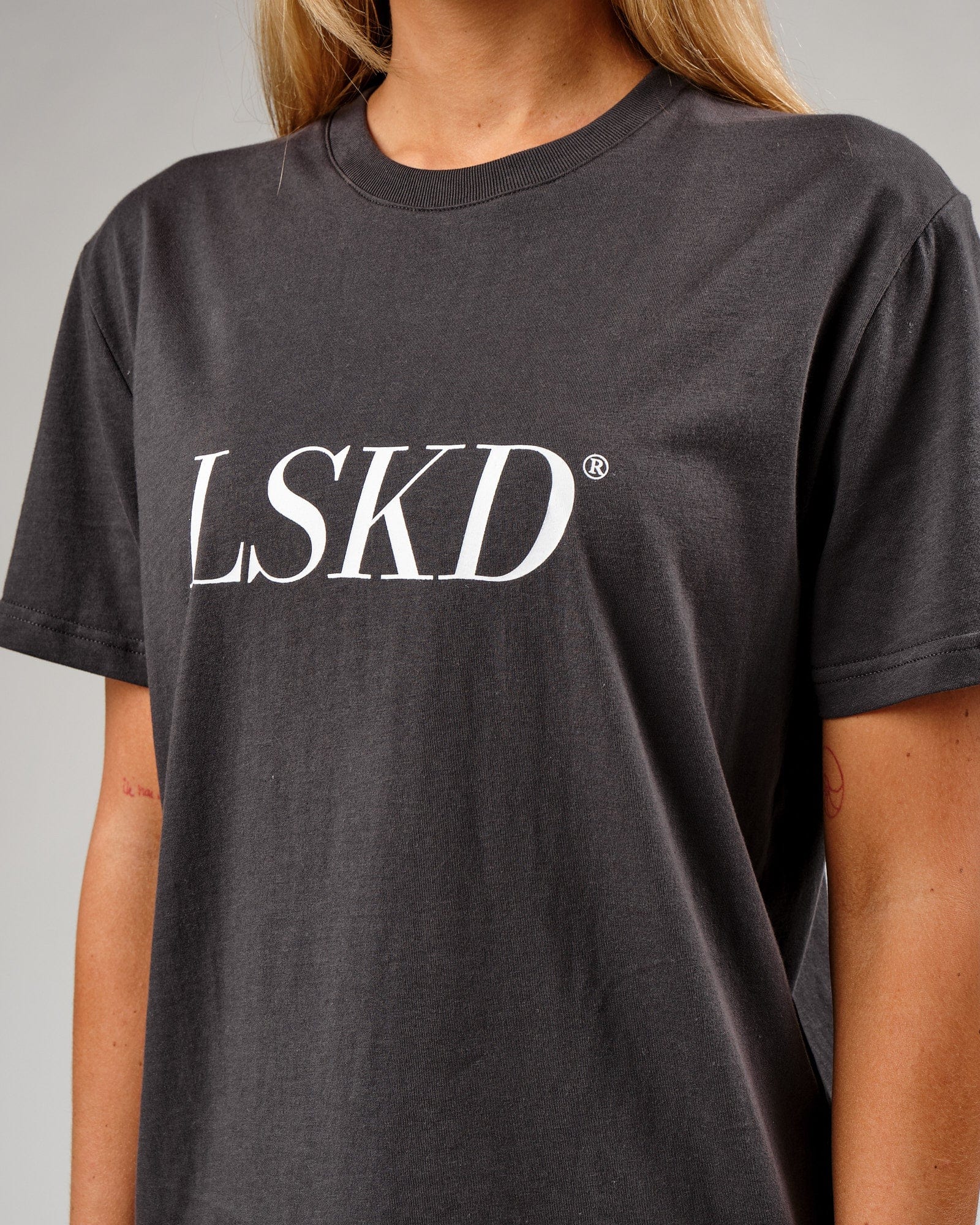 Model wearing IT Tee - Phantom