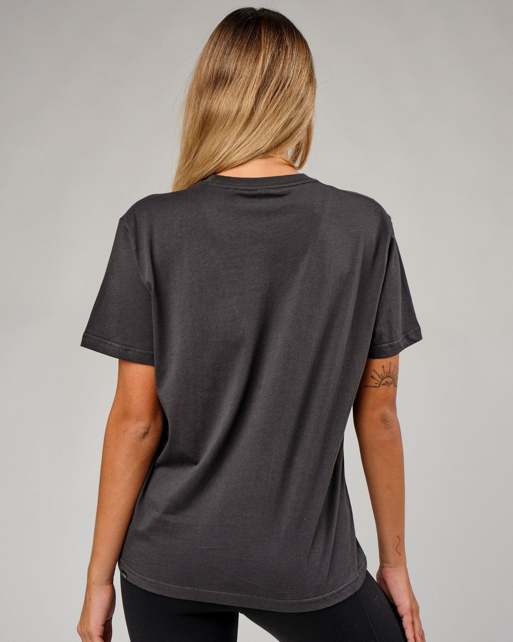 Model wearing IT Tee - Phantom