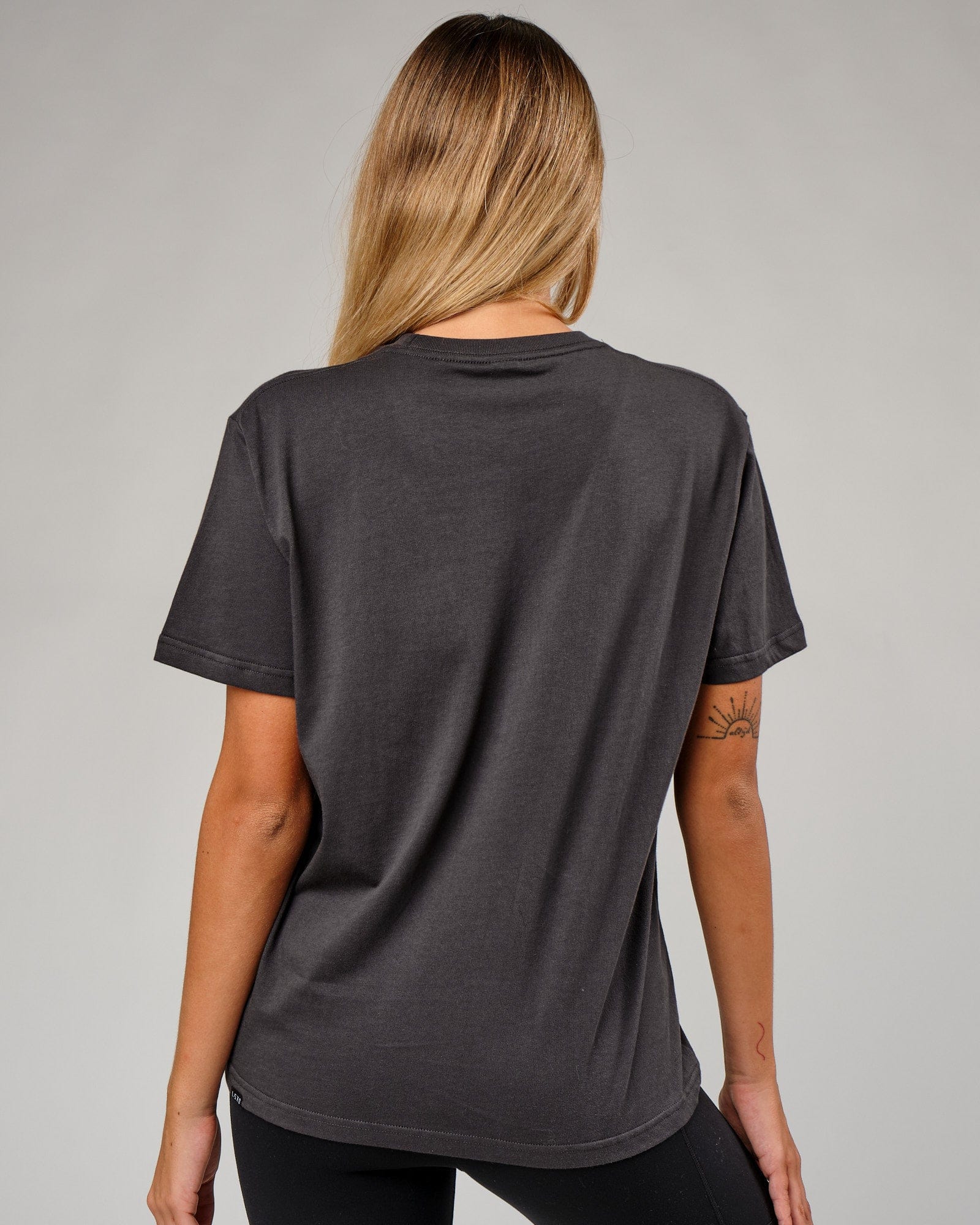 Model wearing IT Tee - Phantom