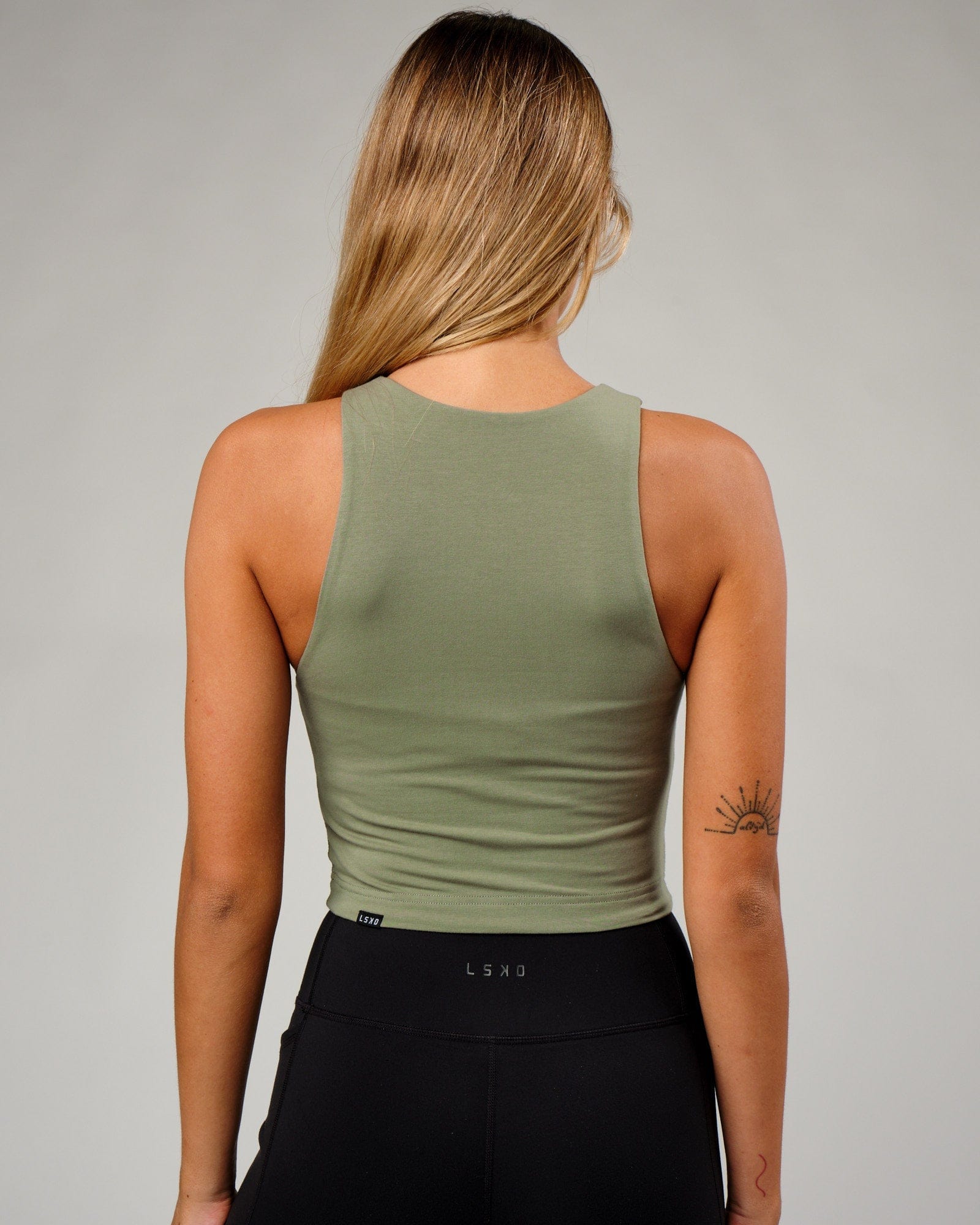 Model wearing Warm-Up Tank - Sea Spray