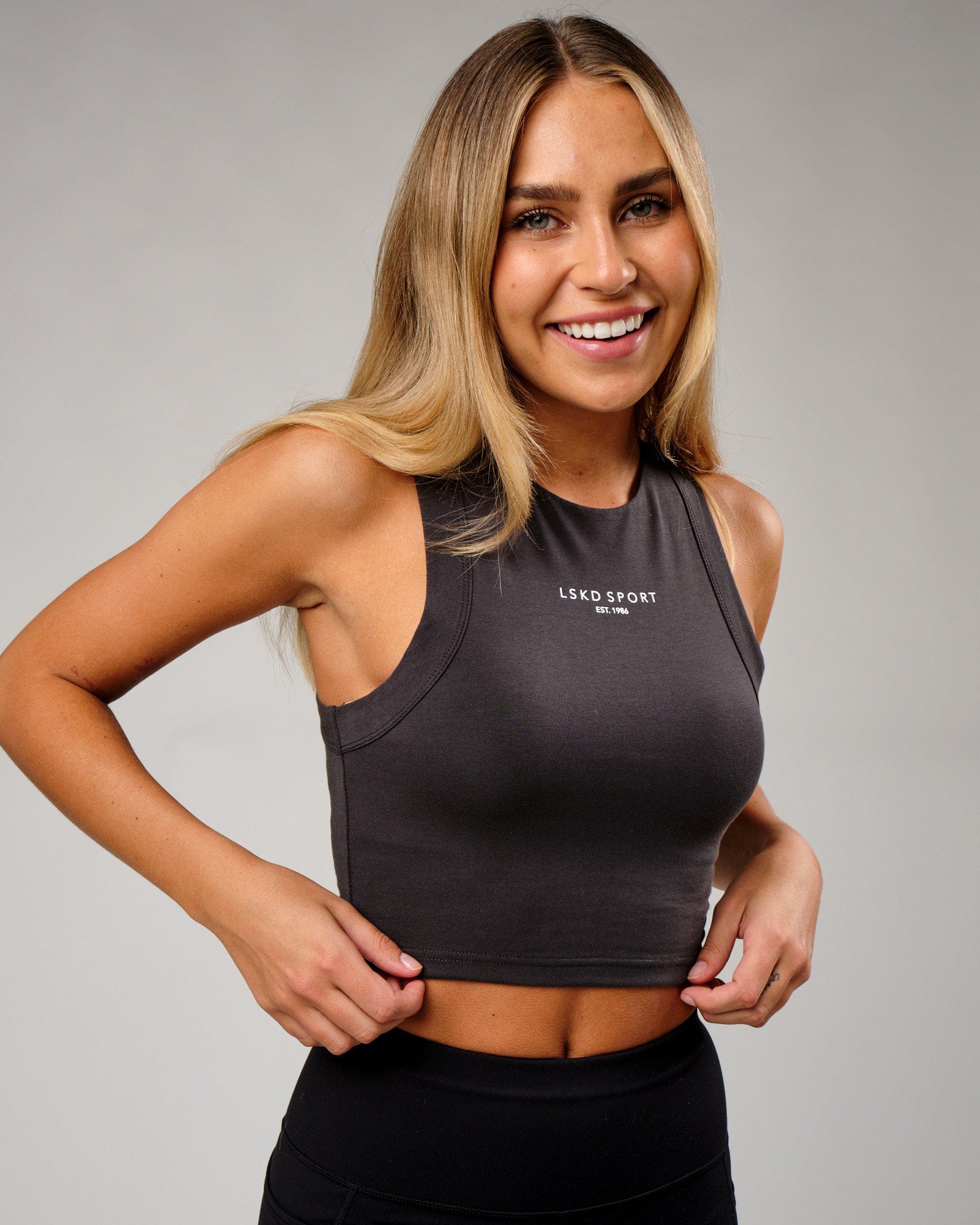 Model wearing Run Tank - Phantom