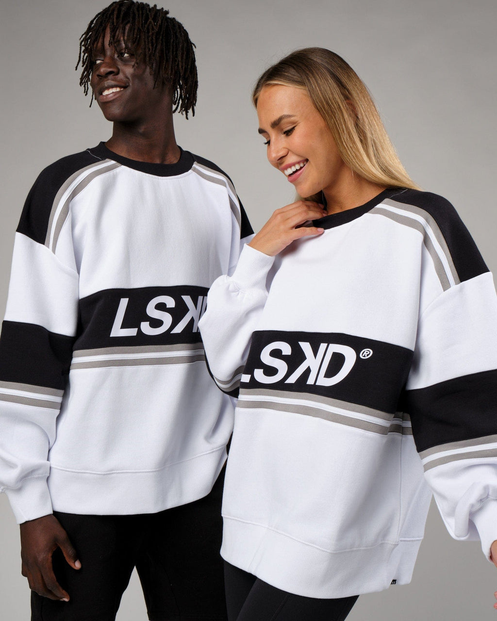 Model wearing Unisex A-Team Sweater Oversize - White-Black-Alloy