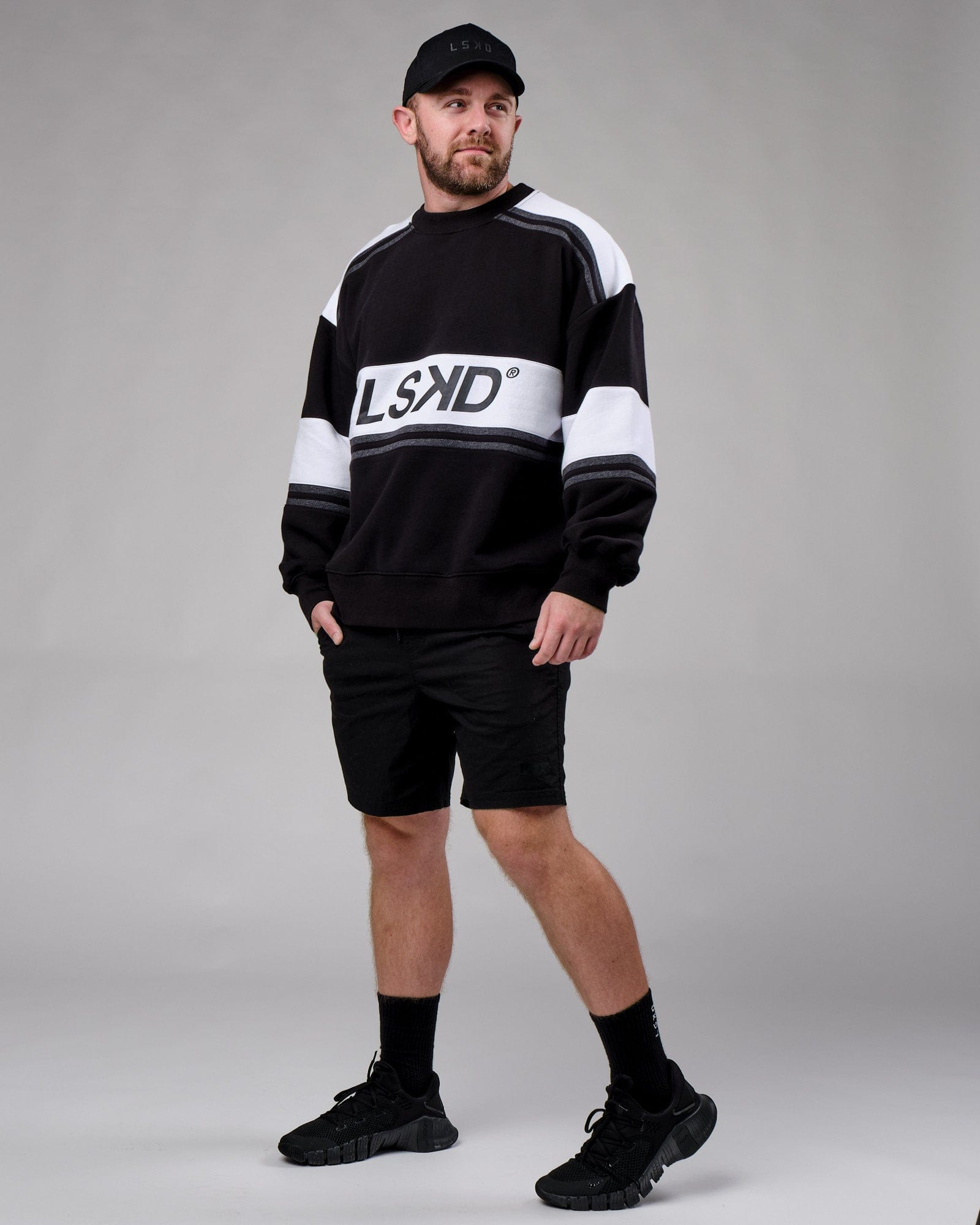 Model wearing Unisex A-Team Sweater Oversize - Black-White