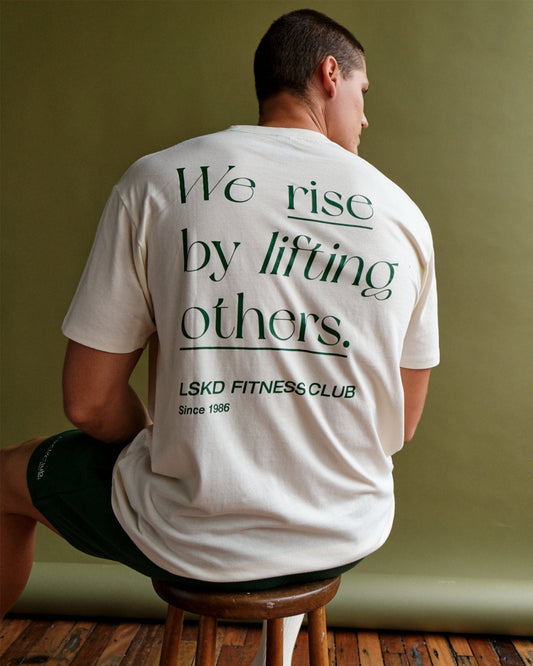 Model wearing Uplift Tee Oversize - Cream