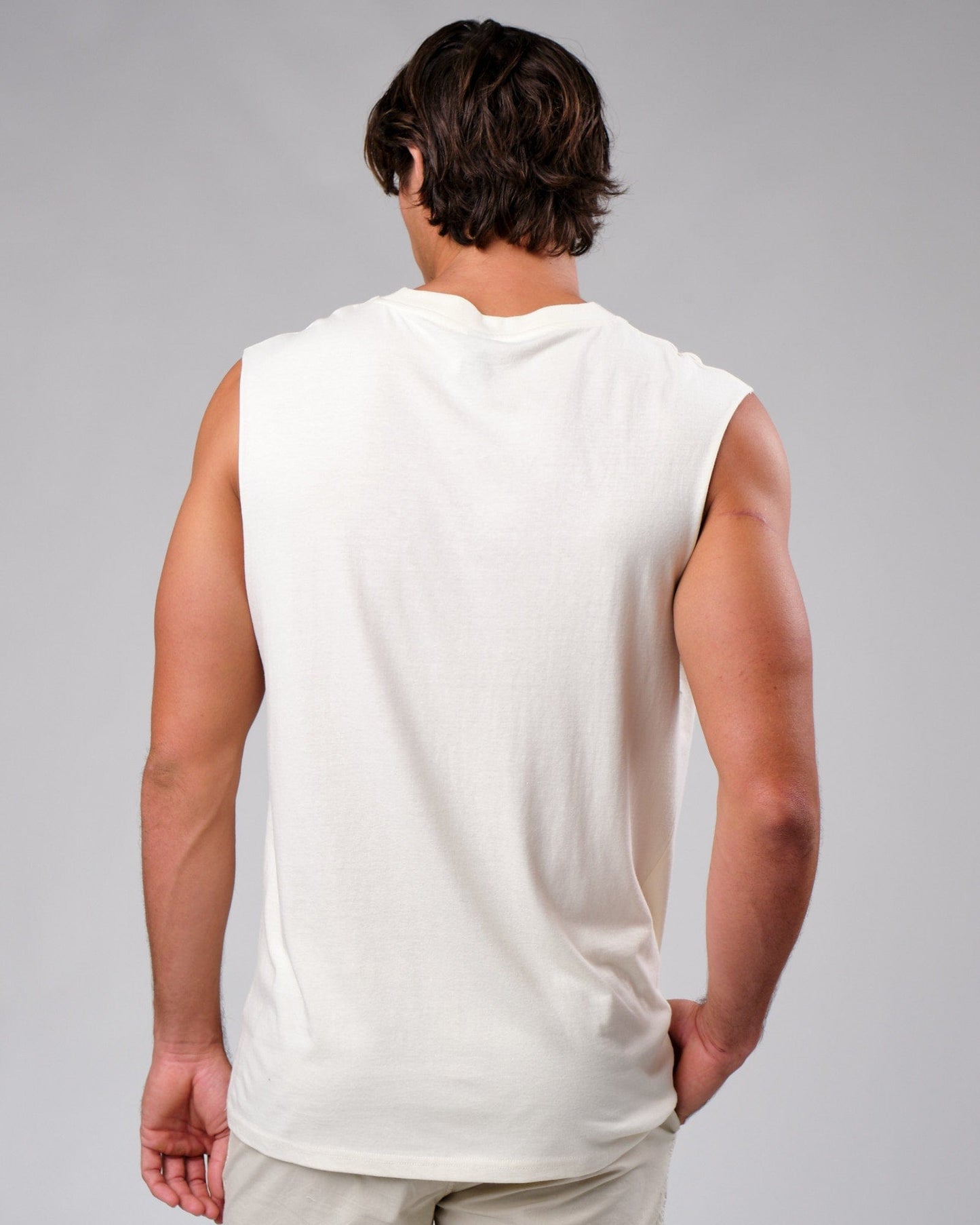 Model wearing Badge Tank Oversize - Cream