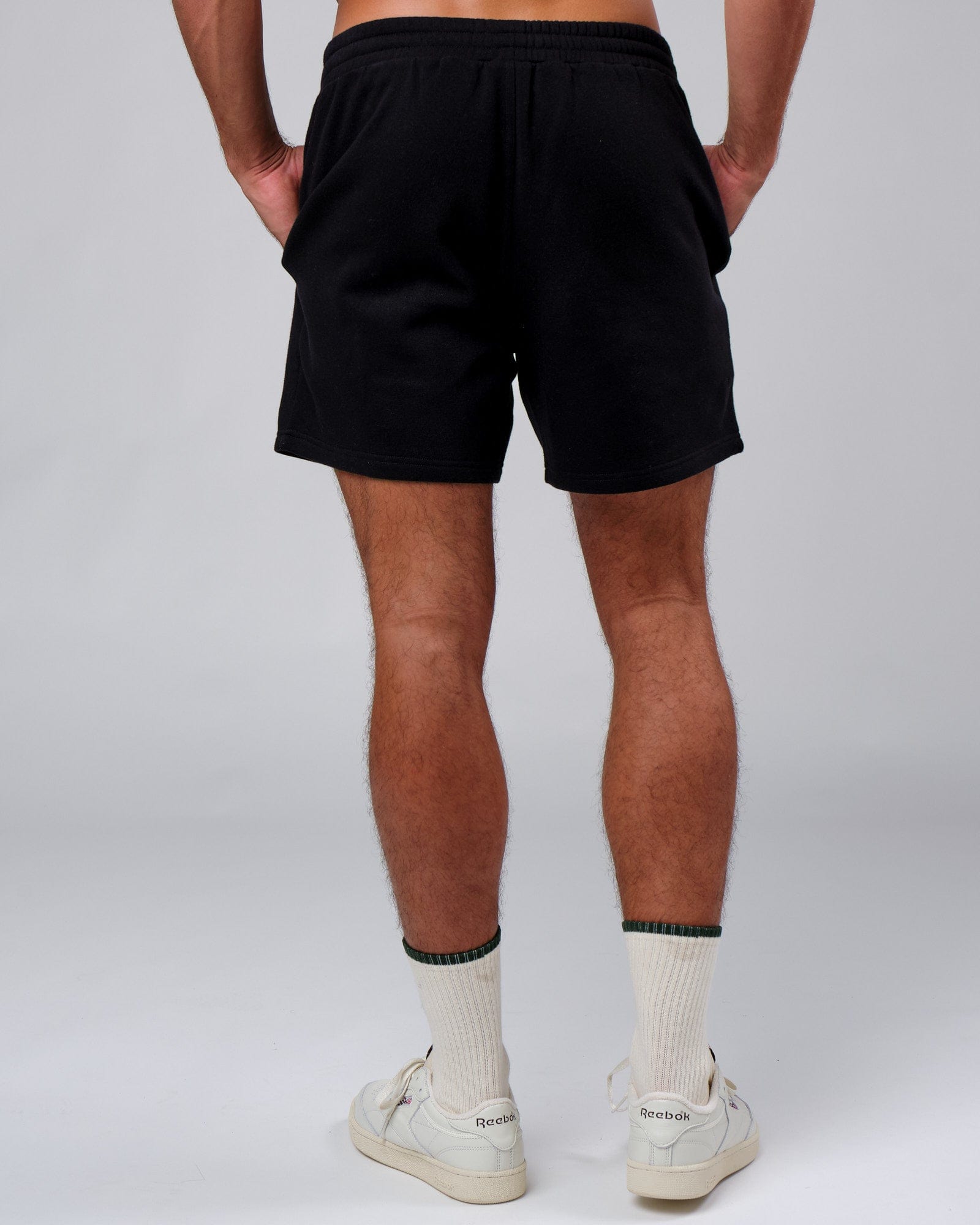 Model wearing Clubhouse Track Short - Black