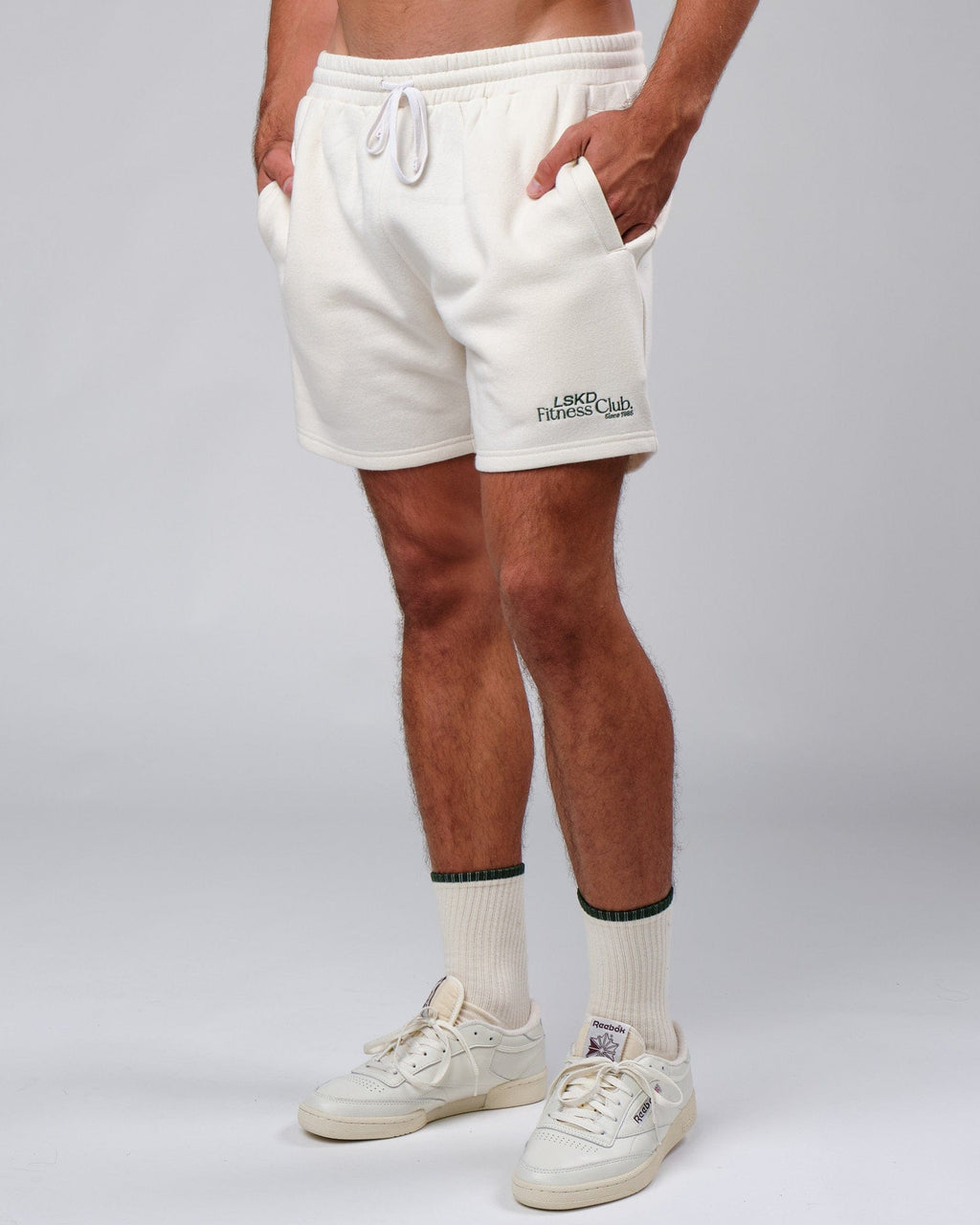 Model wearing Clubhouse Track Short - Cream