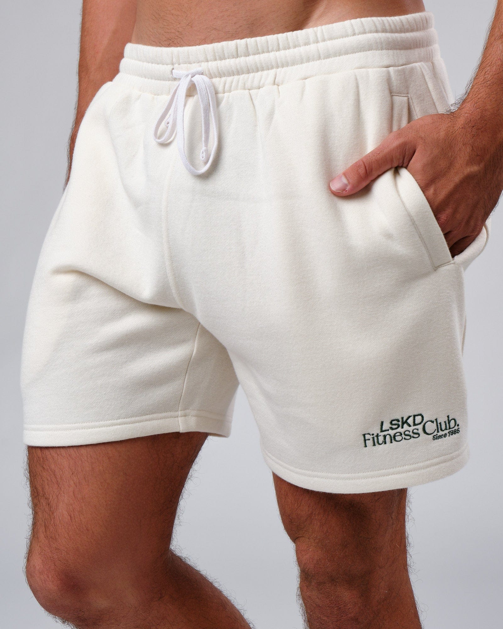 Model wearing Clubhouse Track Short - Cream