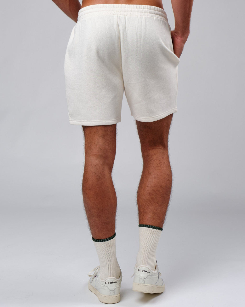 Model wearing Clubhouse Track Short - Cream