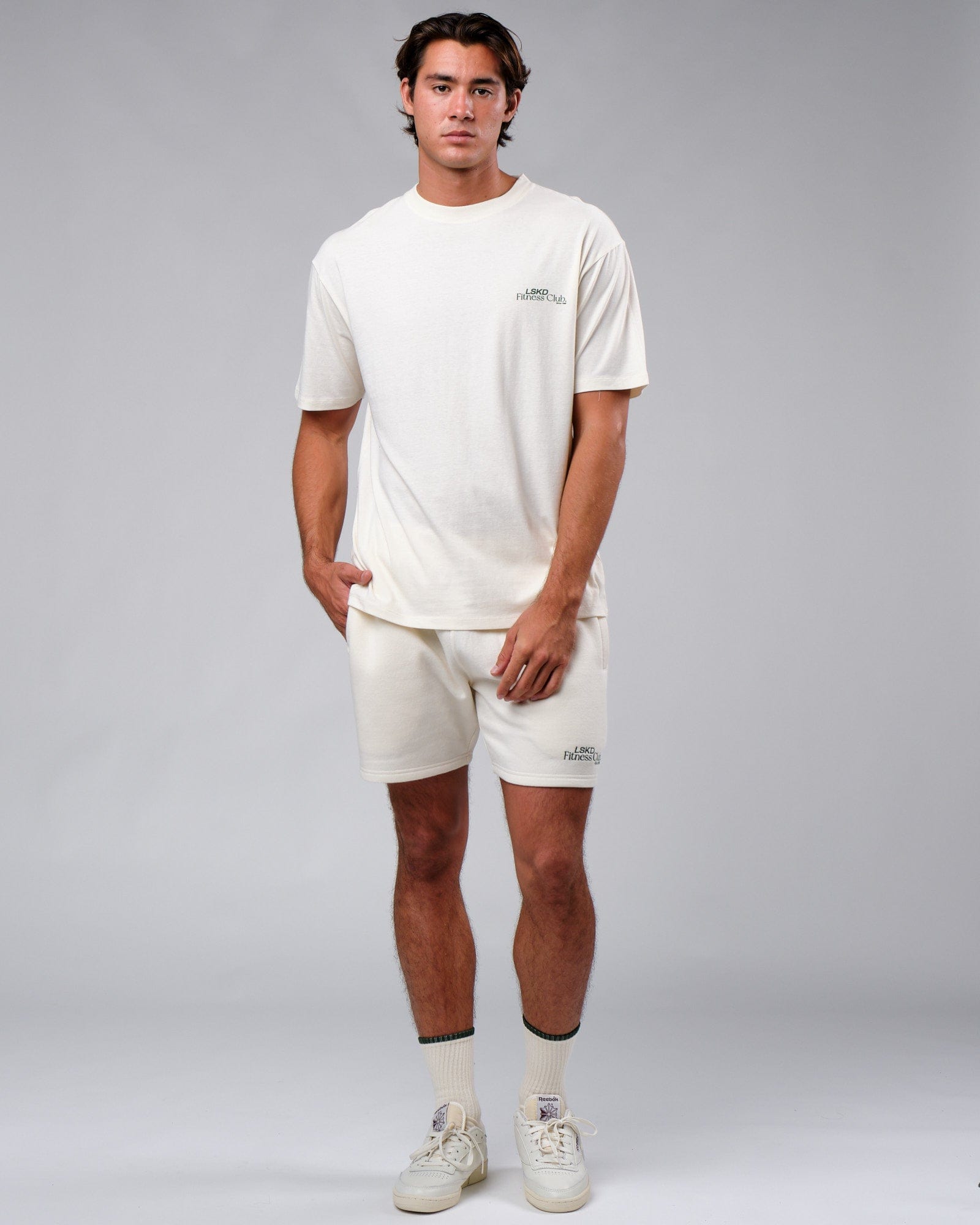 Model wearing Clubhouse Track Short - Cream
