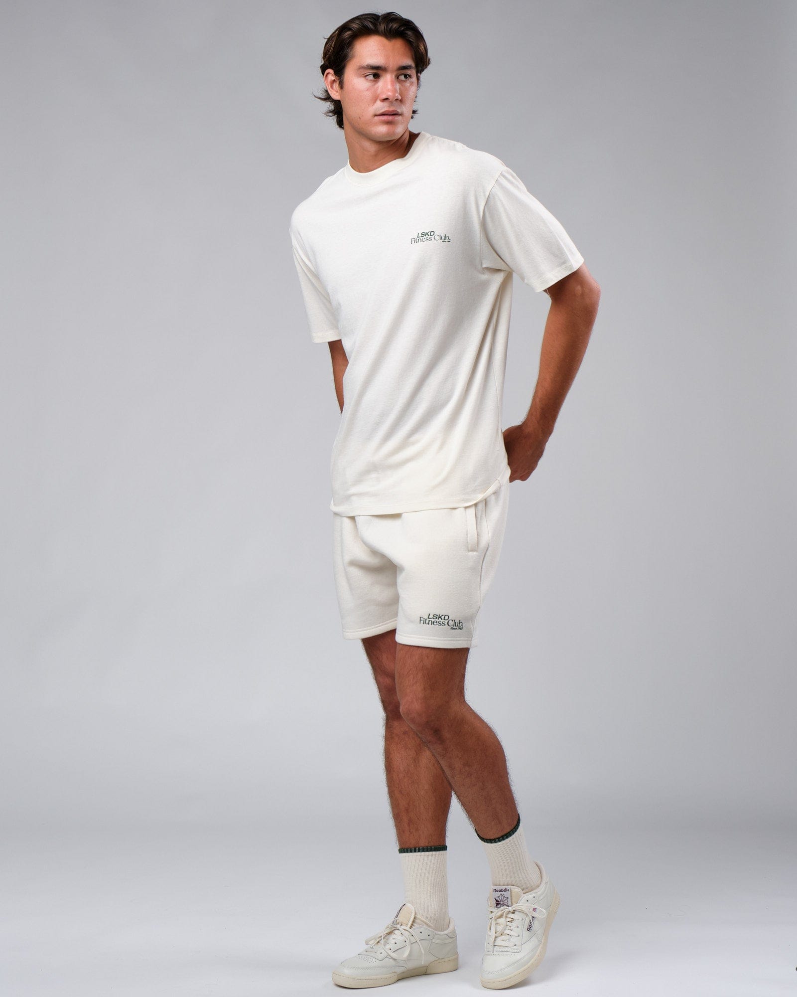 Model wearing Clubhouse Track Short - Cream