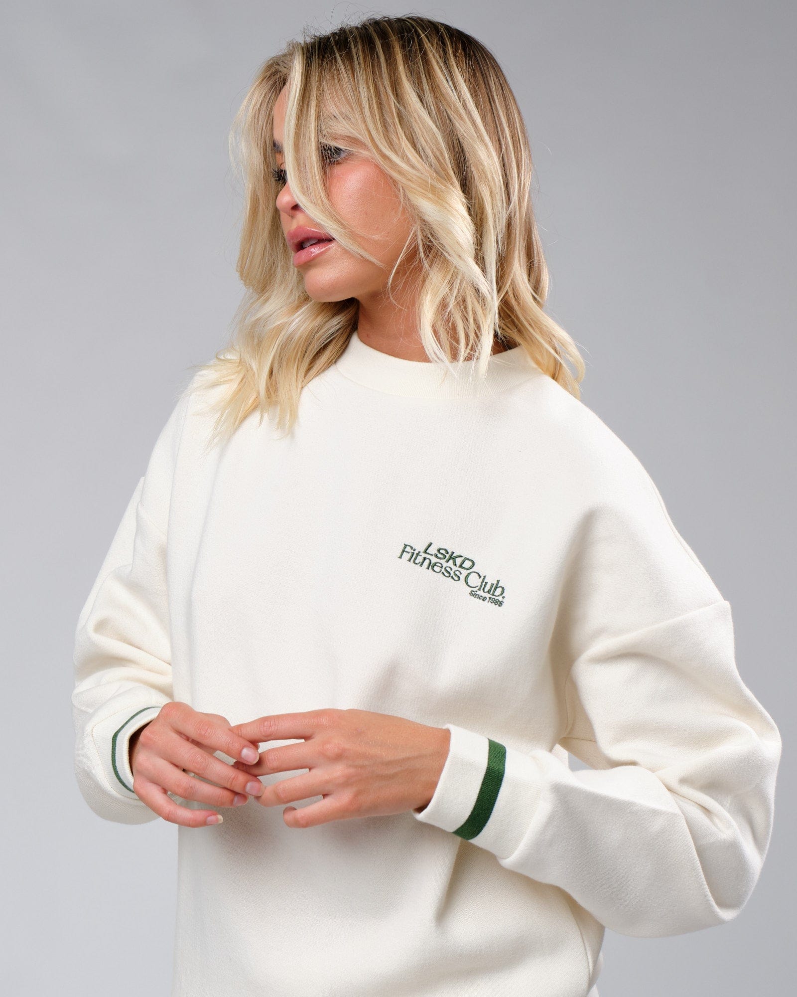 Model wearing Unisex Clubhouse Sweater Oversize - Cream