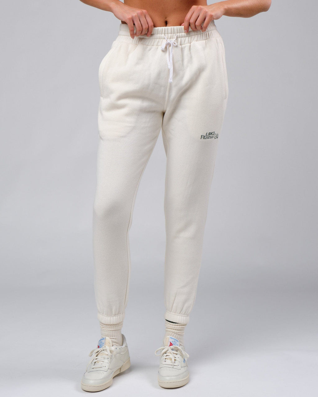 Model wearing Unisex Clubhouse Track Pant - Cream