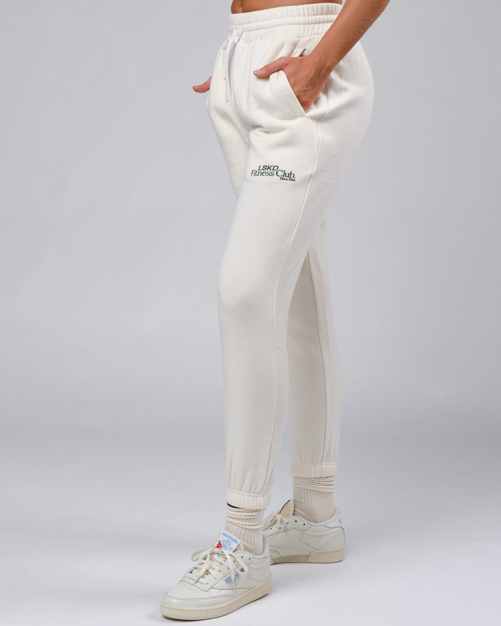 Model wearing Unisex Clubhouse Track Pant - Cream