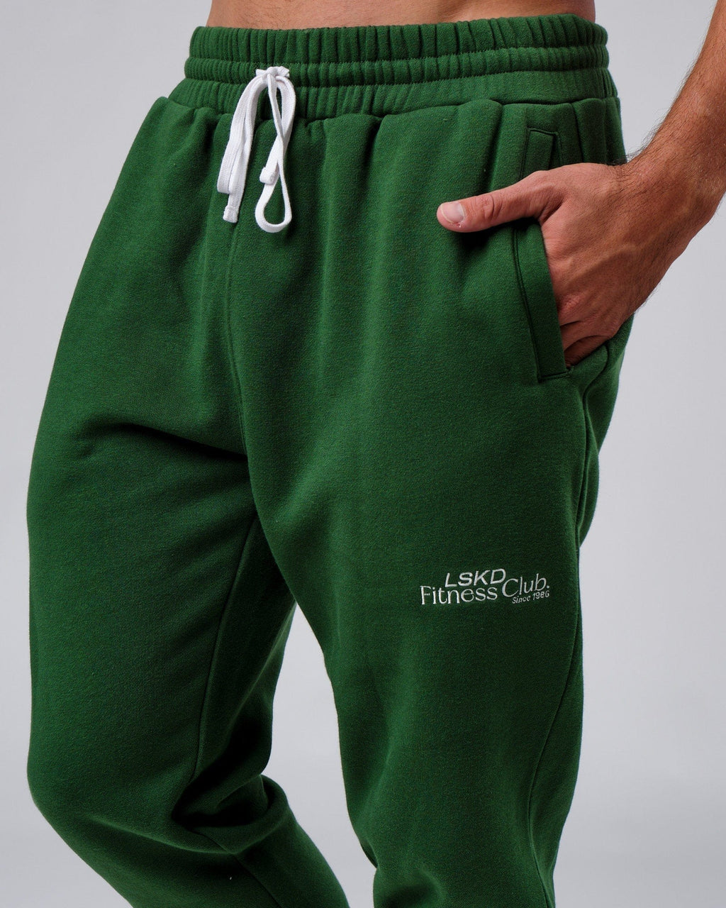 Model wearing Clubhouse Track Pant - Eden Green