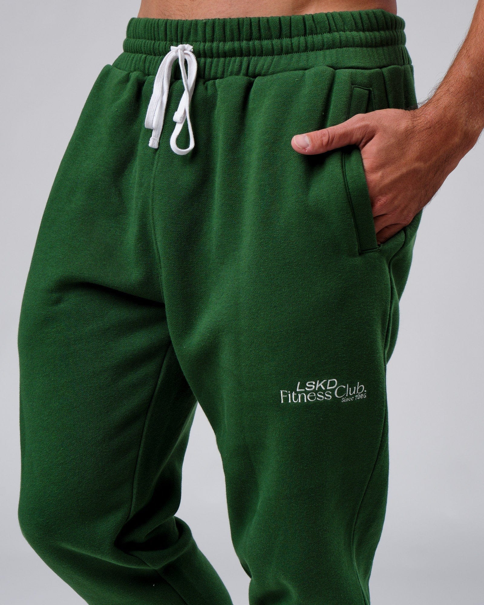 Model wearing Clubhouse Track Pant - Eden Green