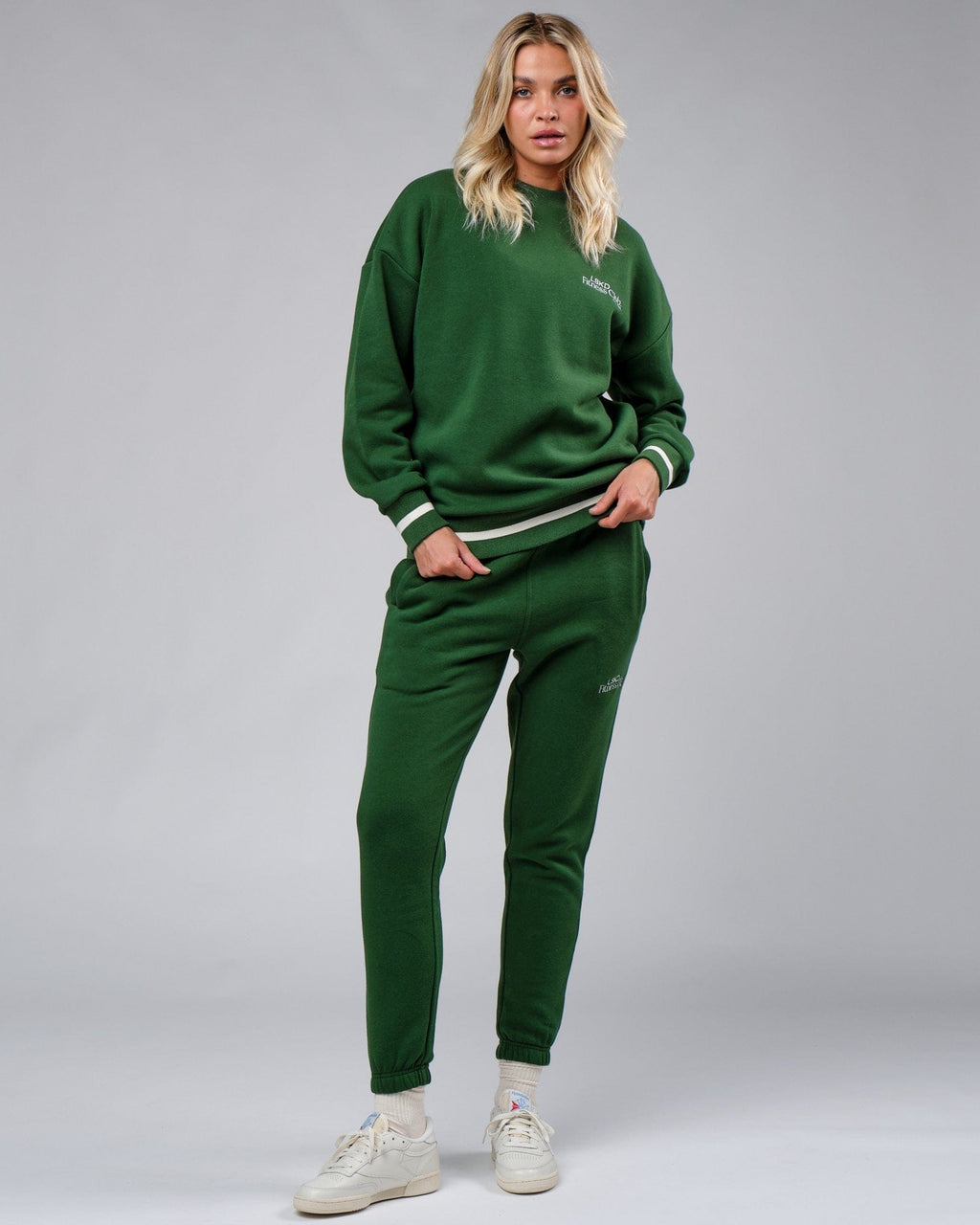 Model wearing Unisex Clubhouse Track Pant - Eden Green