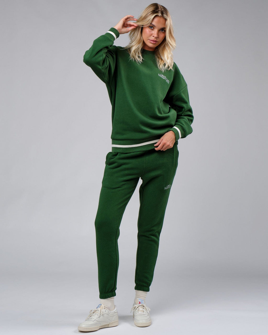 Model wearing Unisex Clubhouse Sweater Oversize - Eden Green