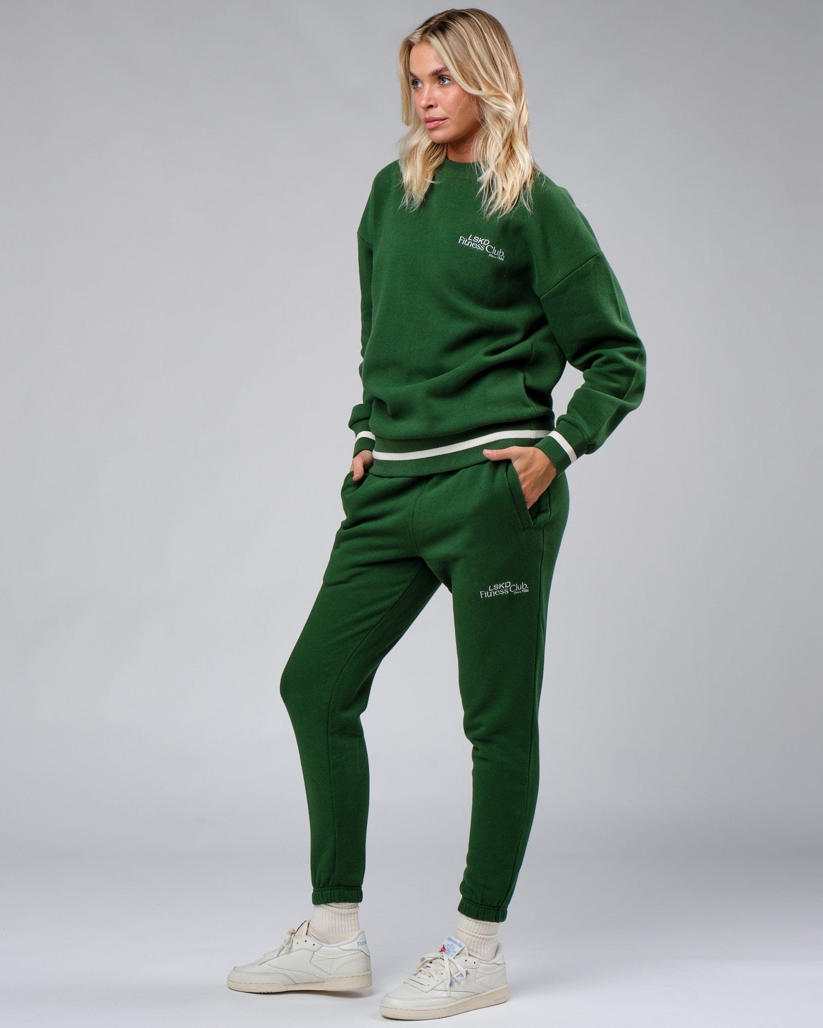 Model wearing Unisex Clubhouse Track Pant - Eden Green