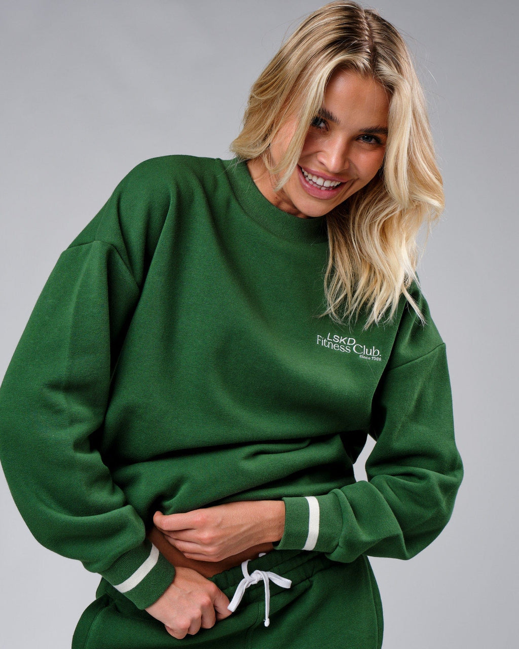 Model wearing Unisex Clubhouse Sweater Oversize - Eden Green