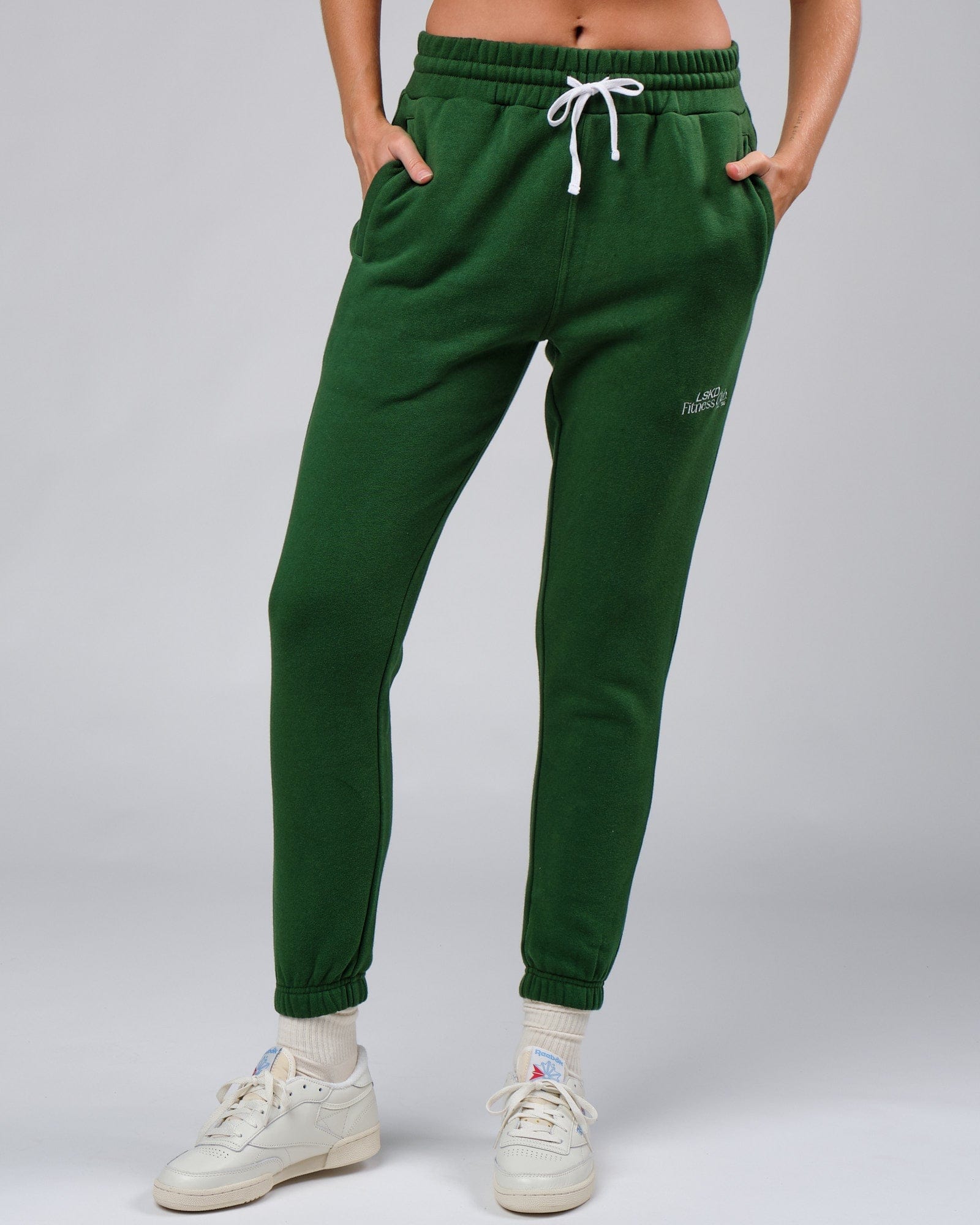 Model wearing Unisex Clubhouse Track Pant - Eden Green