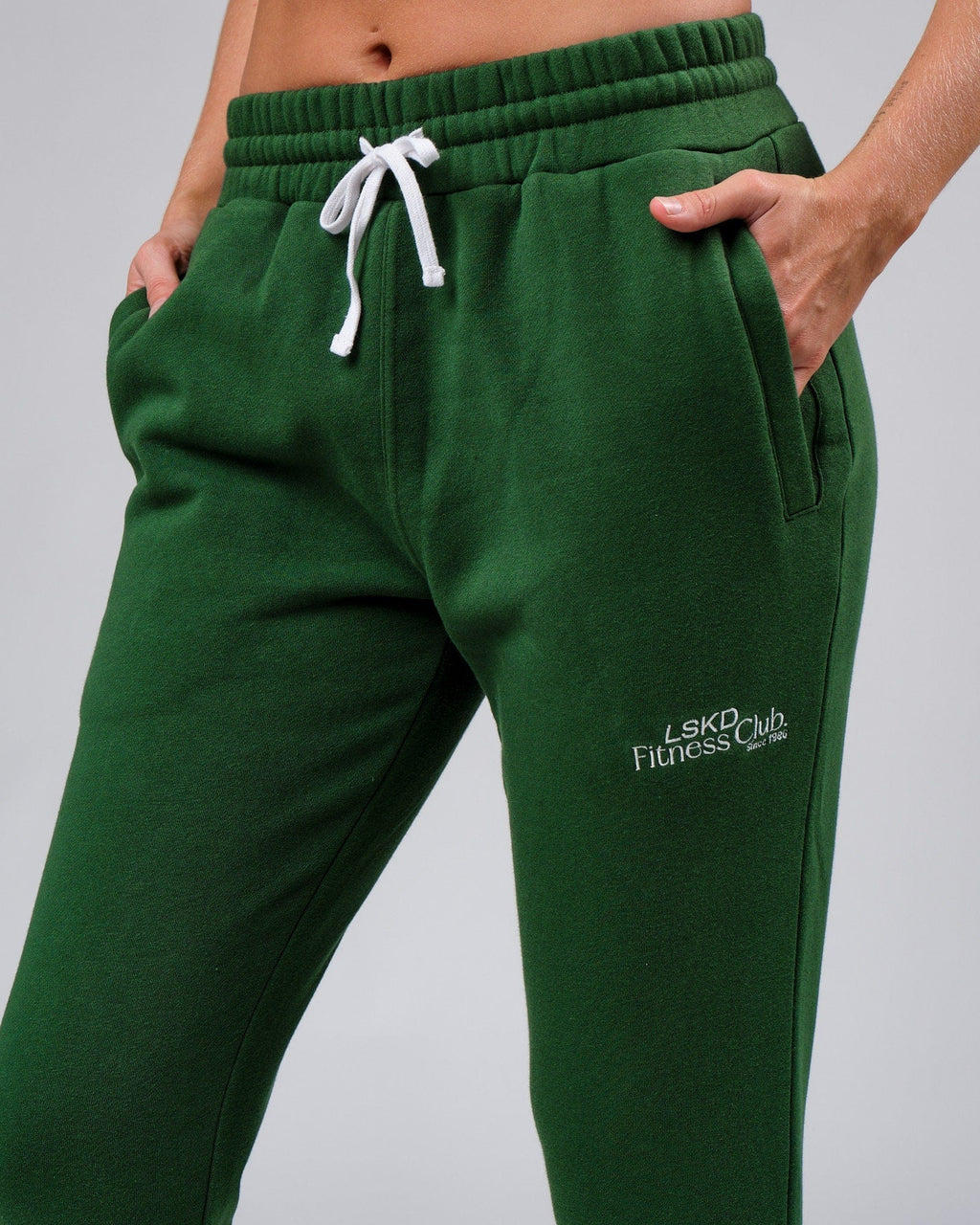 Model wearing Unisex Clubhouse Track Pant - Eden Green