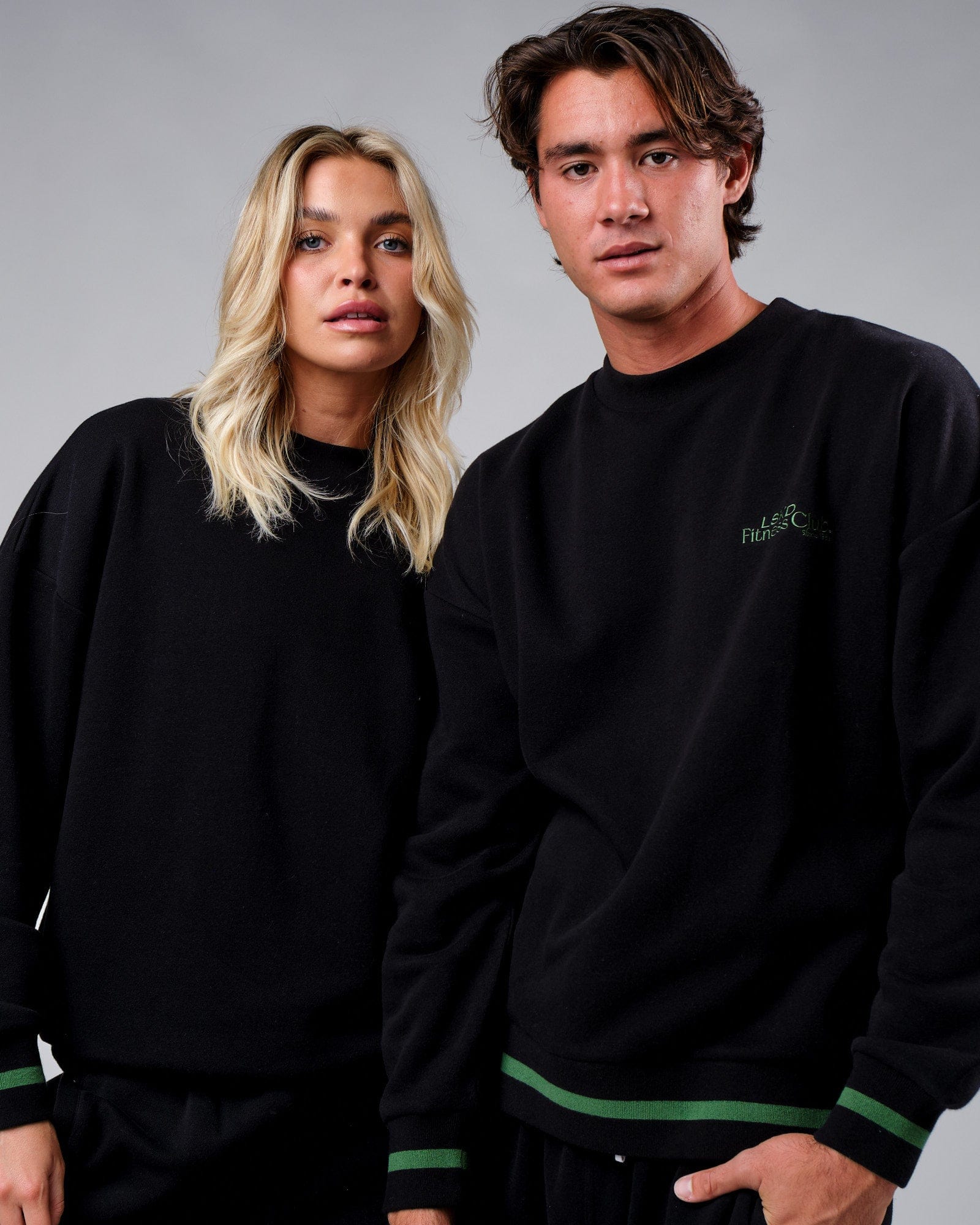 Model wearing Unisex Clubhouse Sweater Oversize - Black