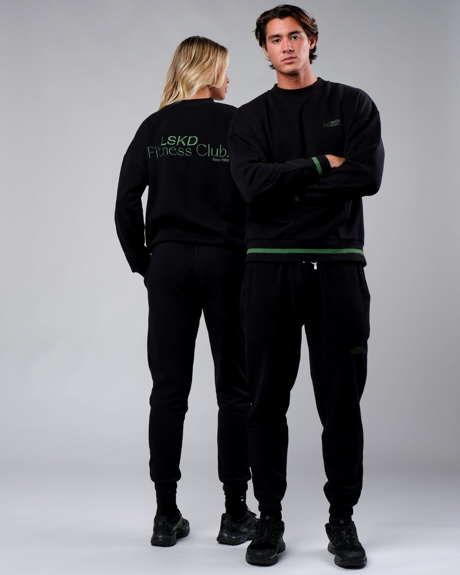Model wearing Unisex Clubhouse Track Pant - Black
