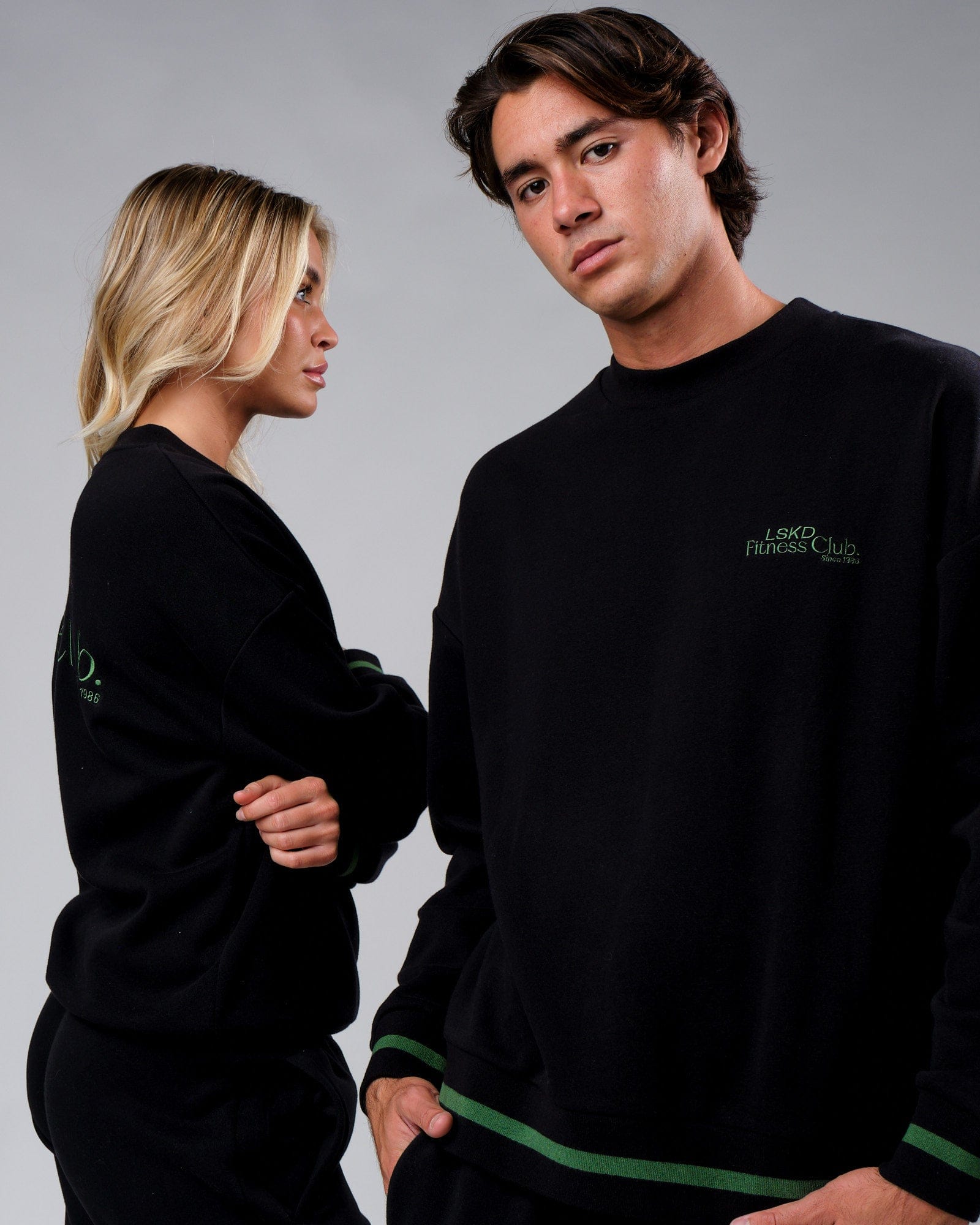Model wearing Unisex Clubhouse Sweater Oversize - Black