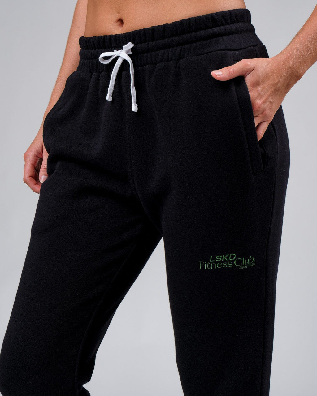 Model wearing Unisex Clubhouse Track Pant - Black