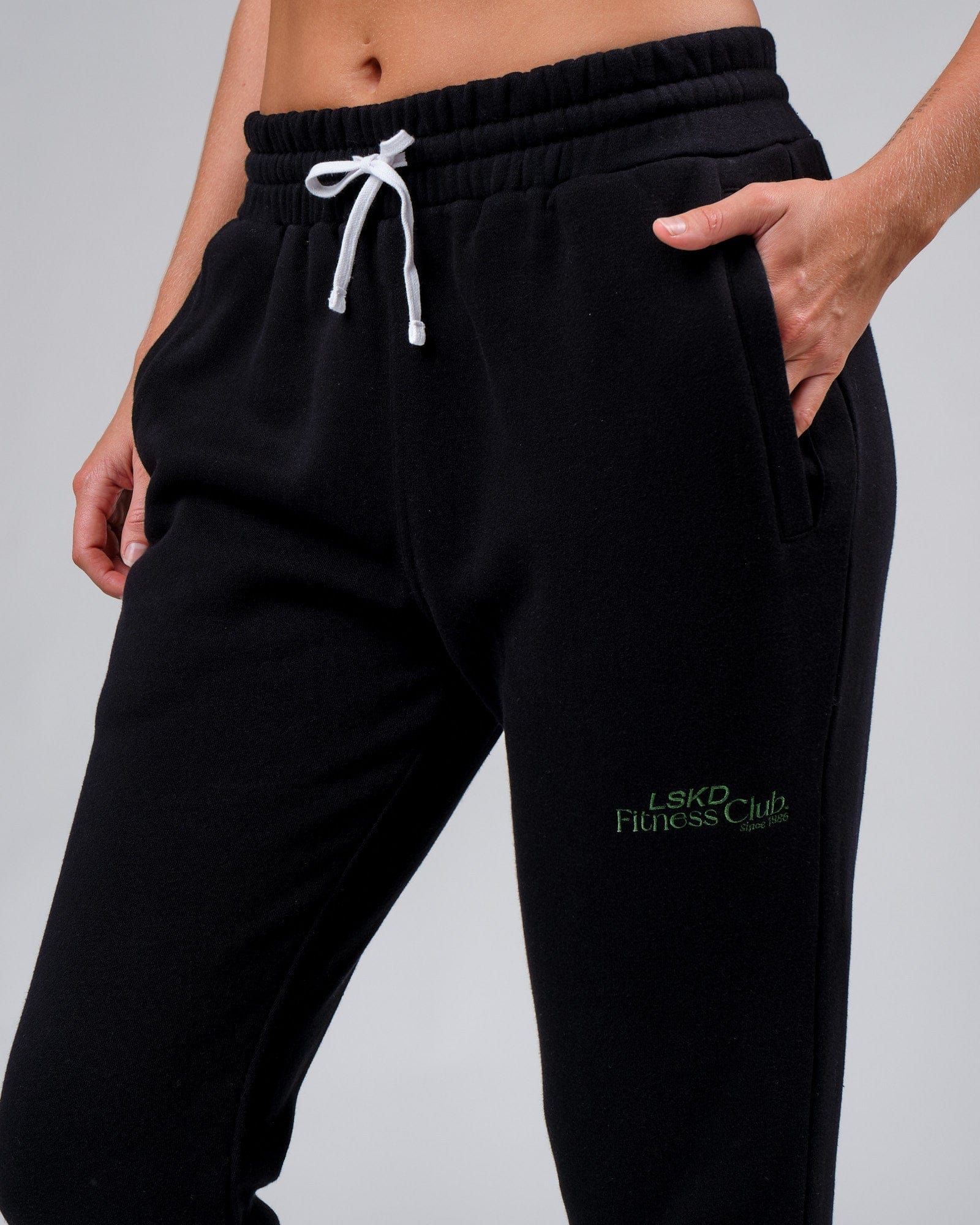 Model wearing Unisex Clubhouse Track Pant - Black