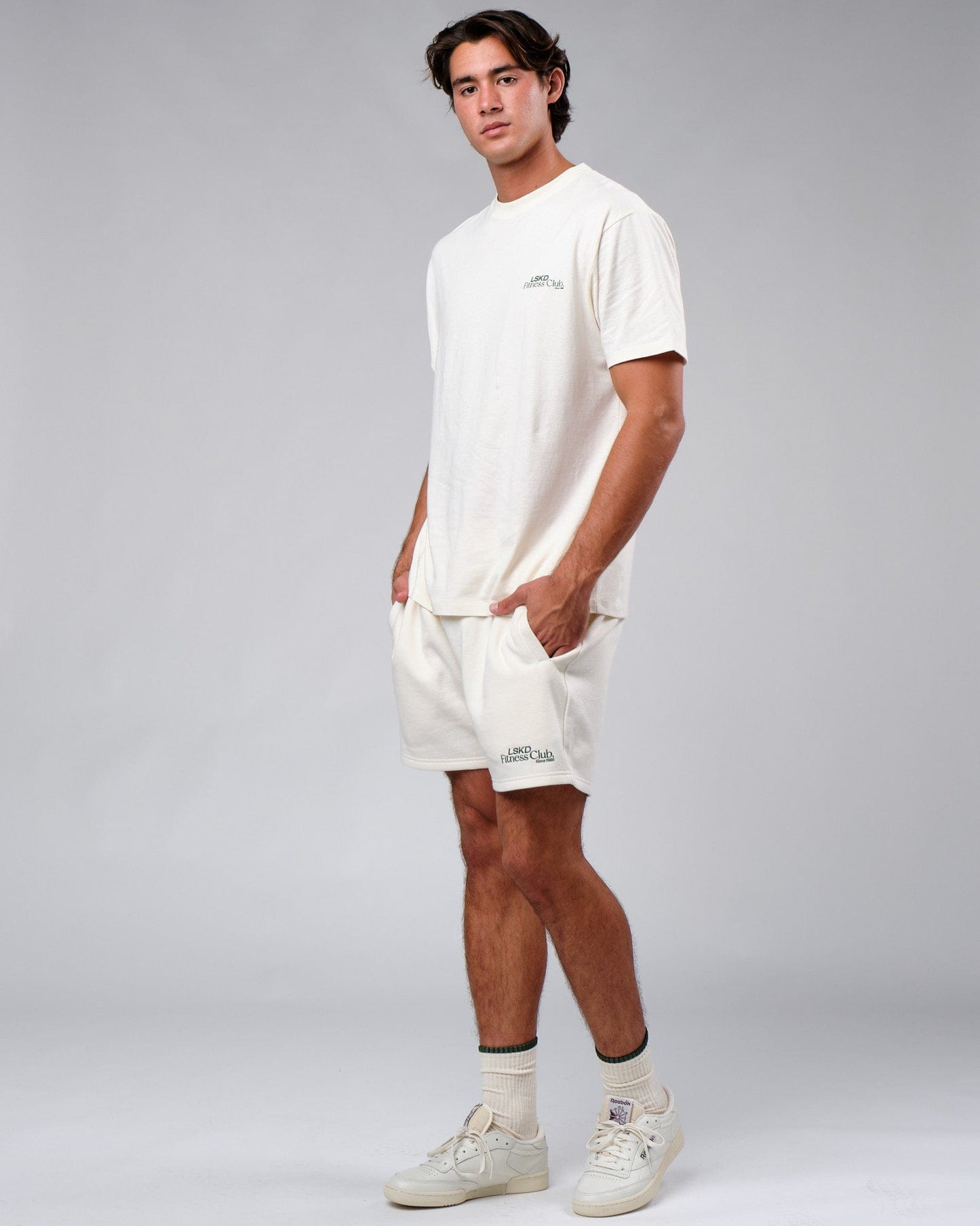 Model wearing Uplift Tee Oversize - Cream