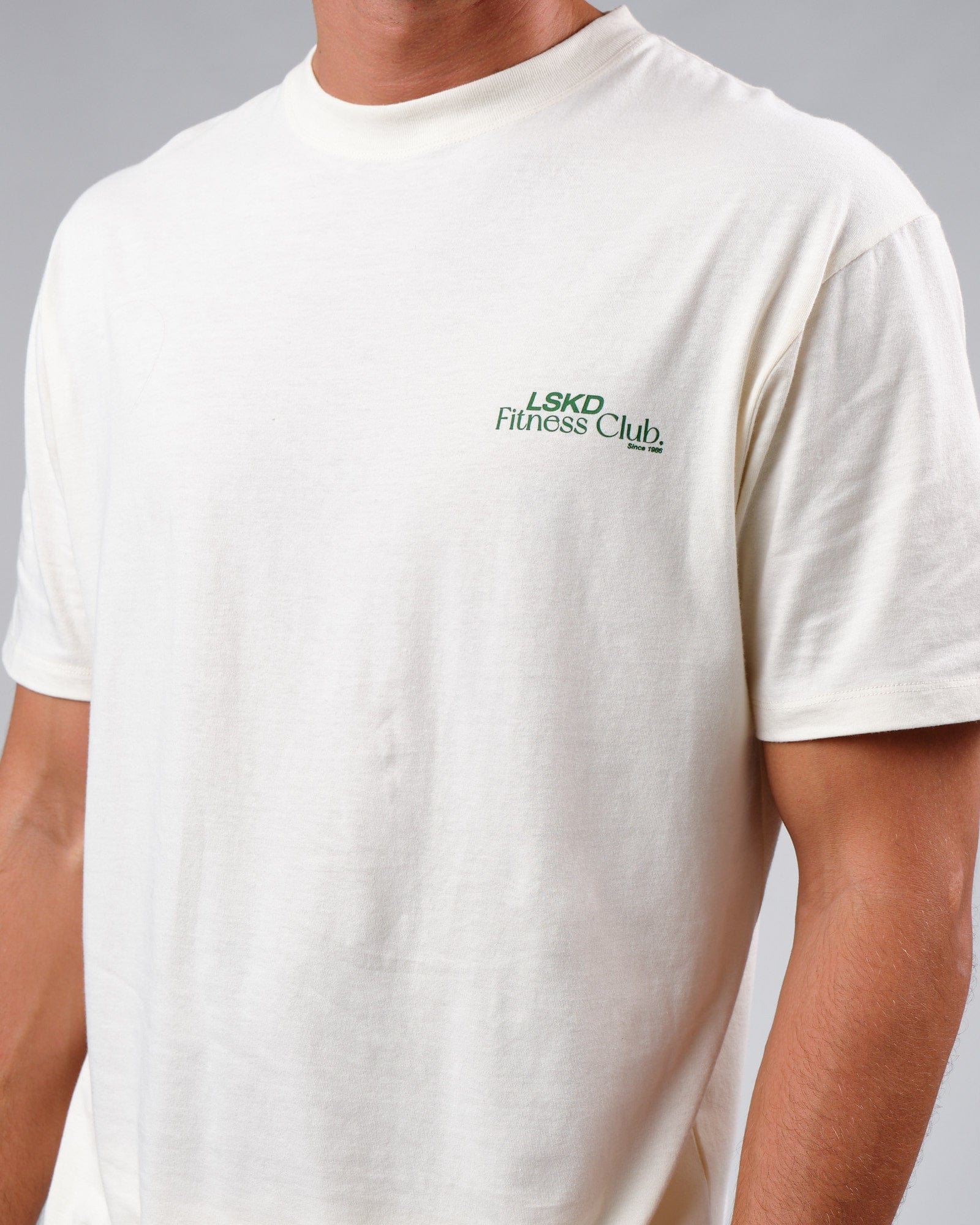 Model wearing Uplift Tee Oversize - Cream