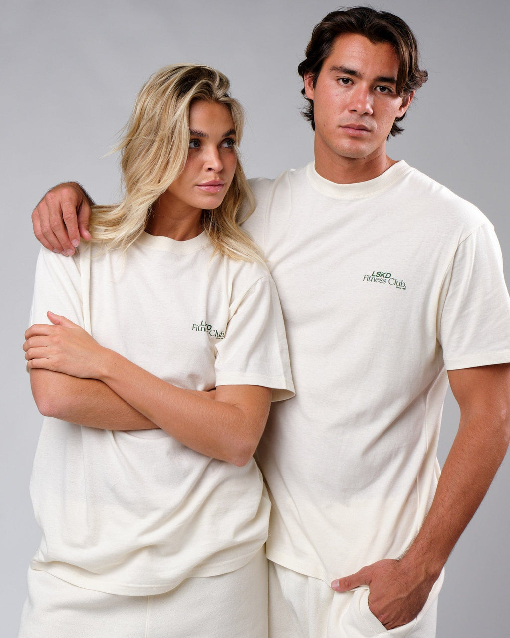 Model wearing Unisex Uplift Tee Oversize - Cream